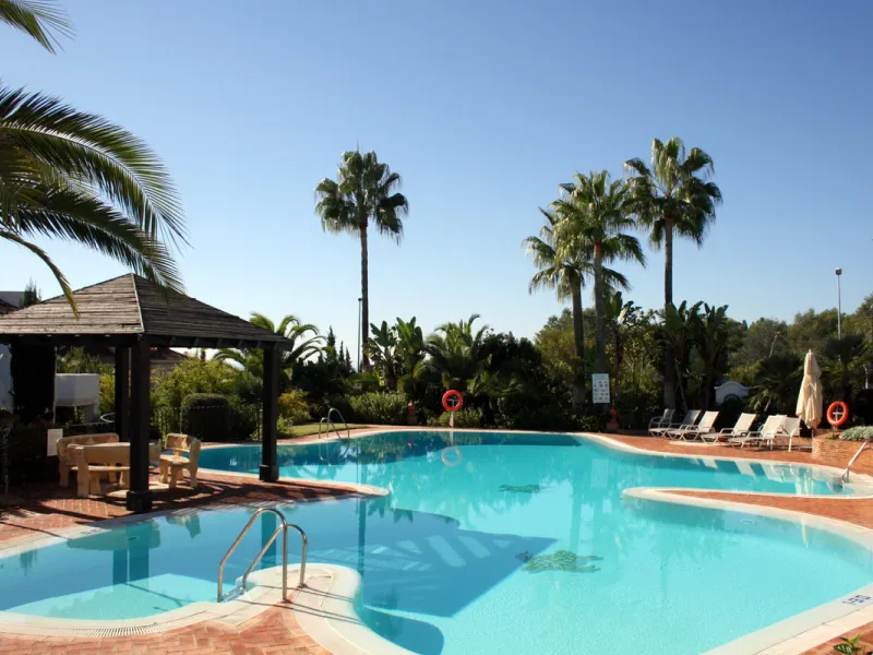 Superb south west facing first floor apartment with panoramic sea views within a five star complex in a luxurious gated urbanisation off the Golden Mile, Marbella.
