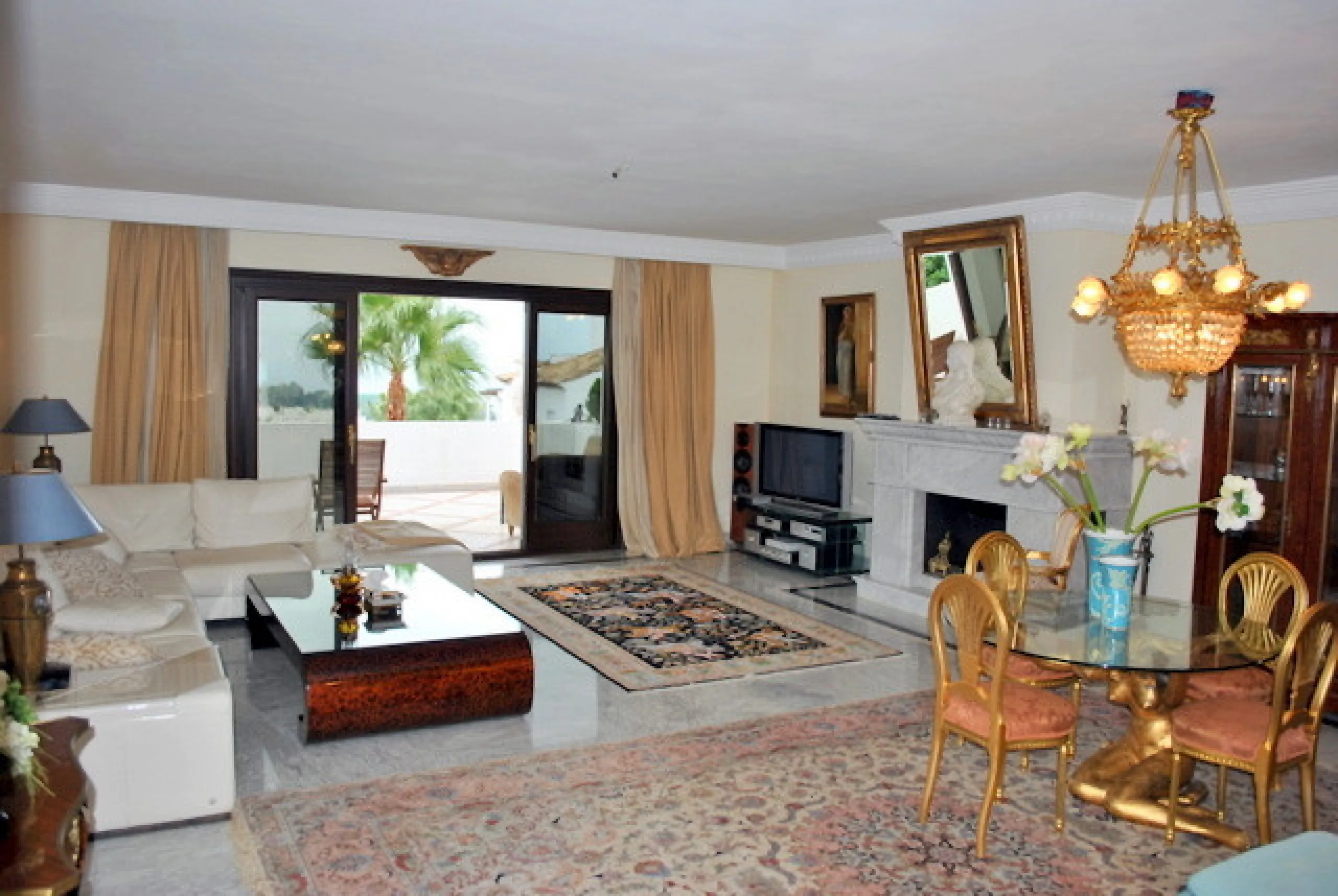 Superb south west facing first floor apartment with panoramic sea views within a five star complex in a luxurious gated urbanisation off the Golden Mile, Marbella.