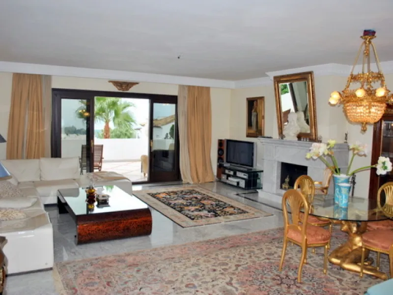 Superb south west facing first floor apartment with panoramic sea views within a five star complex in a luxurious gated urbanisation off the Golden Mile, Marbella.