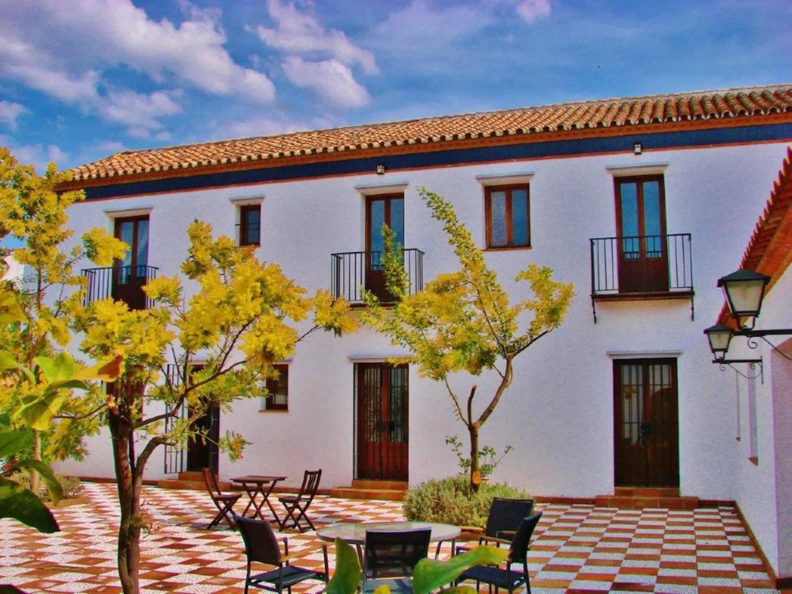 Discover the ultimate Andalusian retreat. A 4-star boutique estate offers a rare blend of historic charm and modern luxury, just 10 minutes from the iconic center of Ronda. This impeccably restored 7-bedroom Cortijo (traditional farmhouse) nestled in the 