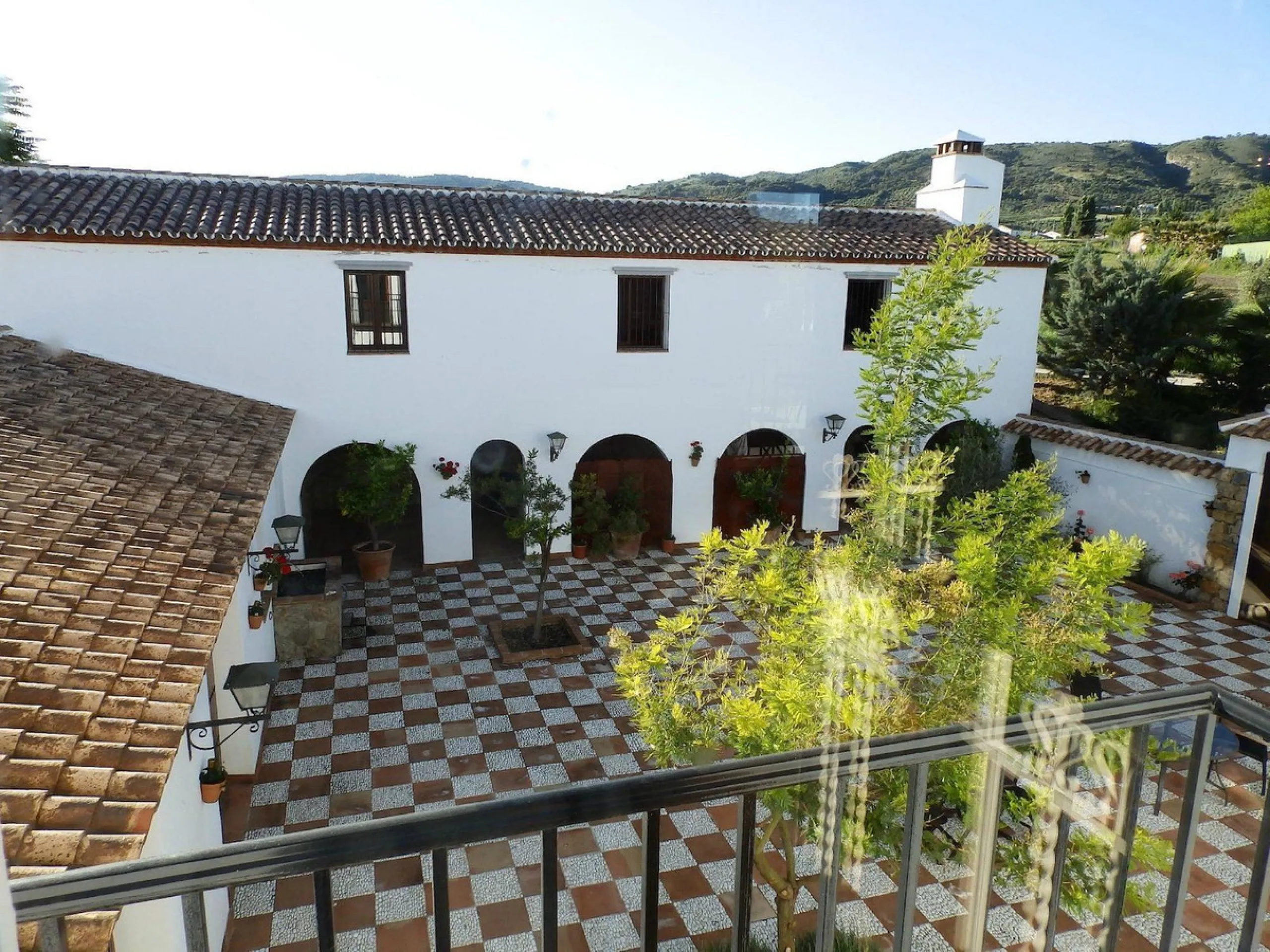 Discover the ultimate Andalusian retreat. A 4-star boutique estate offers a rare blend of historic charm and modern luxury, just 10 minutes from the iconic center of Ronda. This impeccably restored 7-bedroom Cortijo (traditional farmhouse) nestled in the 