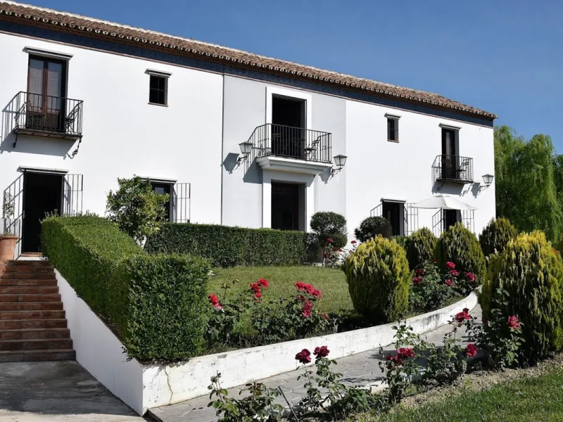 Discover the ultimate Andalusian retreat. A 4-star boutique estate offers a rare blend of historic charm and modern luxury, just 10 minutes from the iconic center of Ronda. This impeccably restored 7-bedroom Cortijo (traditional farmhouse) nestled in the 