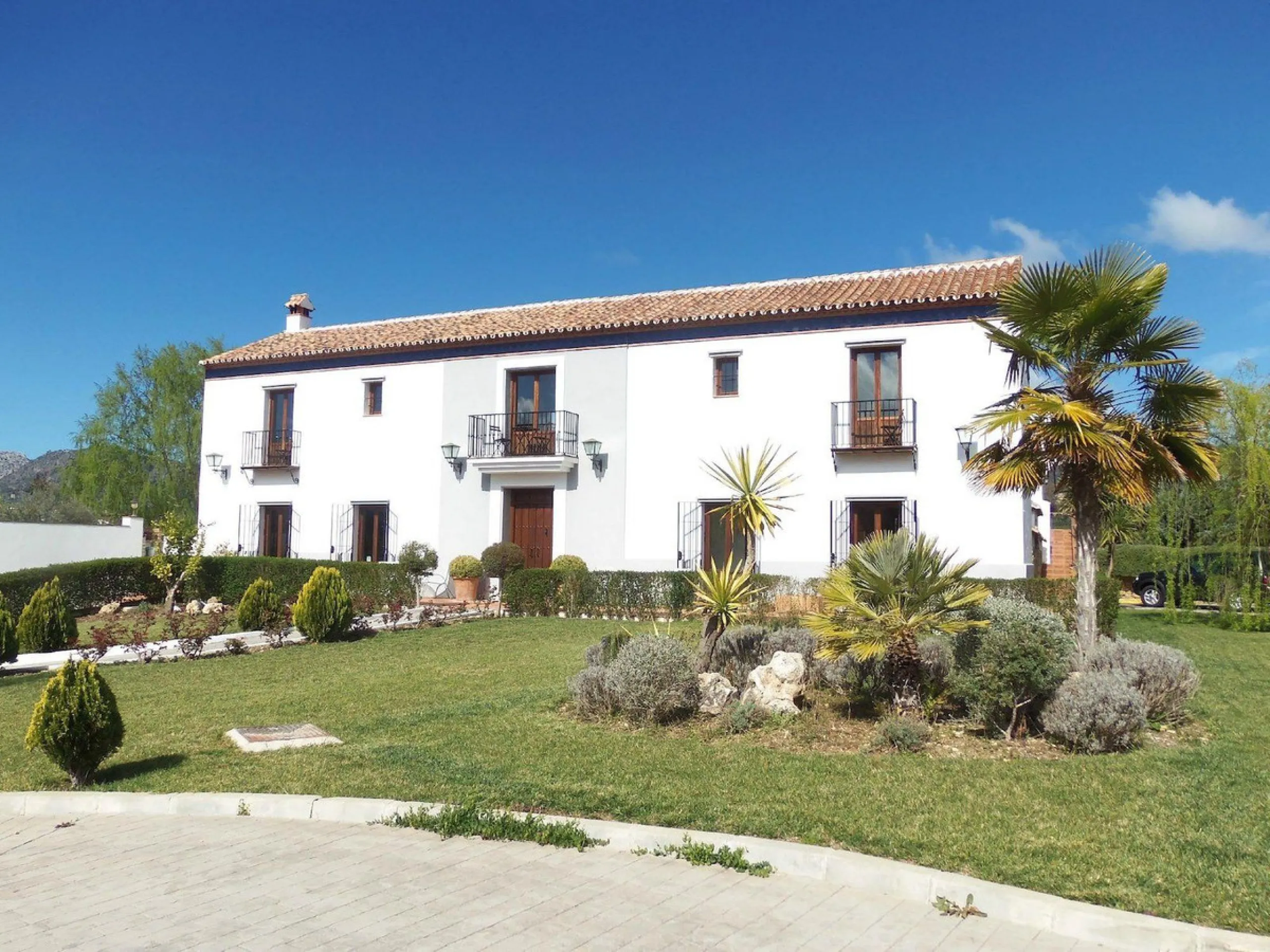 Discover the ultimate Andalusian retreat. A 4-star boutique estate offers a rare blend of historic charm and modern luxury, just 10 minutes from the iconic center of Ronda. This impeccably restored 7-bedroom Cortijo (traditional farmhouse) nestled in the 