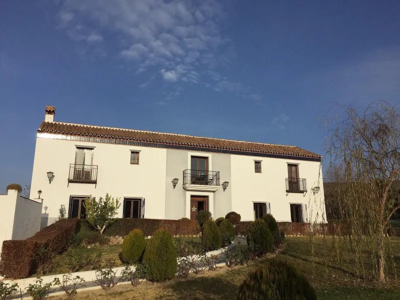Discover the ultimate Andalusian retreat. A 4-star boutique estate offers a rare blend of historic charm and modern luxury, just 10 minutes from the iconic center of Ronda. This impeccably restored 7-bedroom Cortijo (traditional farmhouse) nestled in the 
