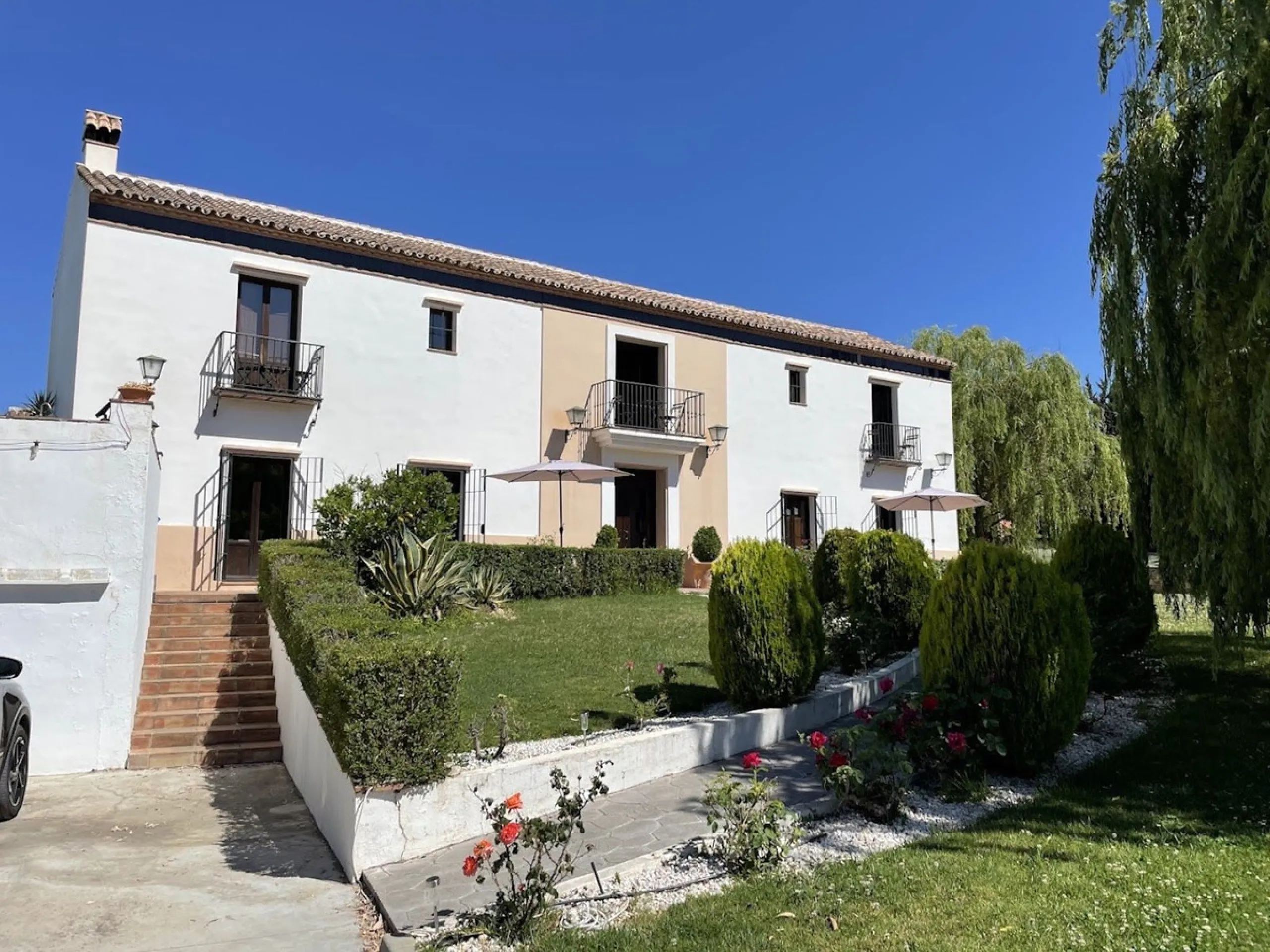 Discover the ultimate Andalusian retreat. A 4-star boutique estate offers a rare blend of historic charm and modern luxury, just 10 minutes from the iconic center of Ronda. This impeccably restored 7-bedroom Cortijo (traditional farmhouse) nestled in the 