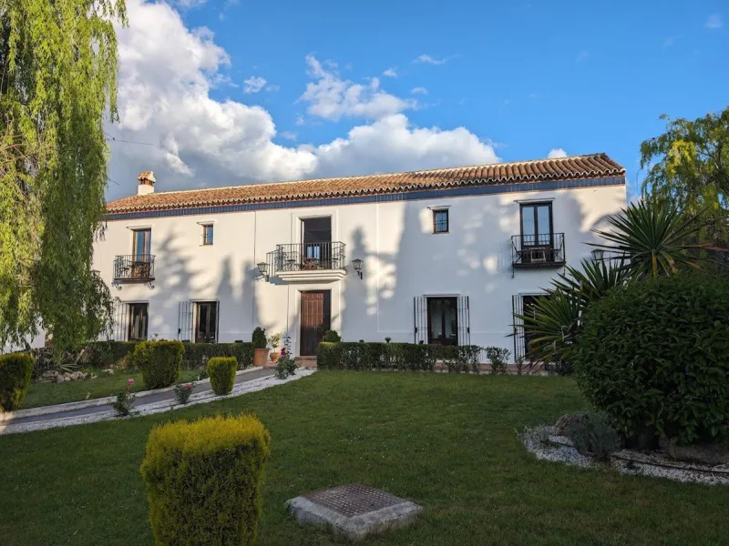 Discover the ultimate Andalusian retreat. A 4-star boutique estate offers a rare blend of historic charm and modern luxury, just 10 minutes from the iconic center of Ronda. This impeccably restored 7-bedroom Cortijo (traditional farmhouse) nestled in the 