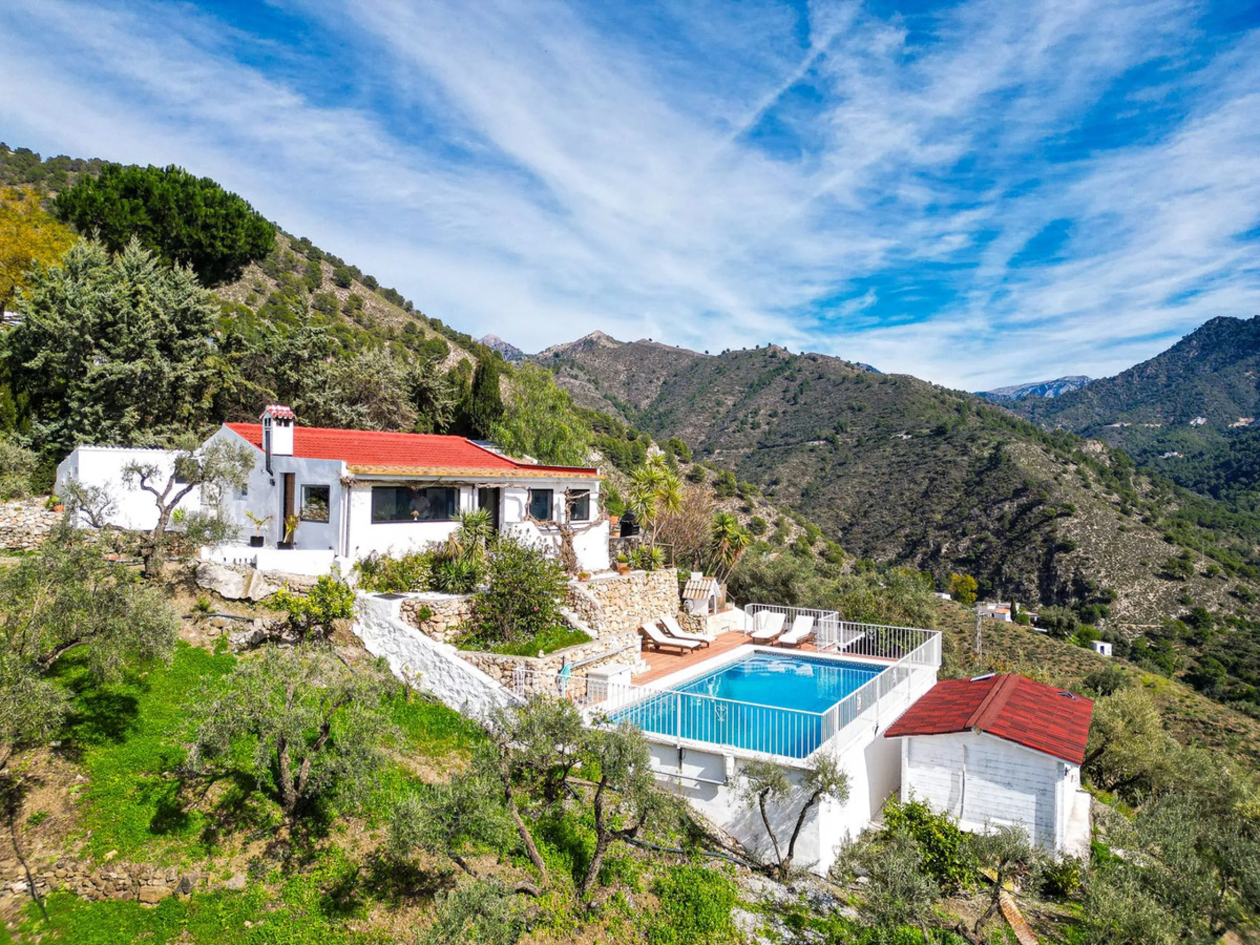 Beautiful countryside villa located in a peaceful valley setting, just a short drive from the vibrant town of Cómpeta. This beautiful country house has been renovated to the highest standards of quality and elegance, offering a refined modern-zen style fi