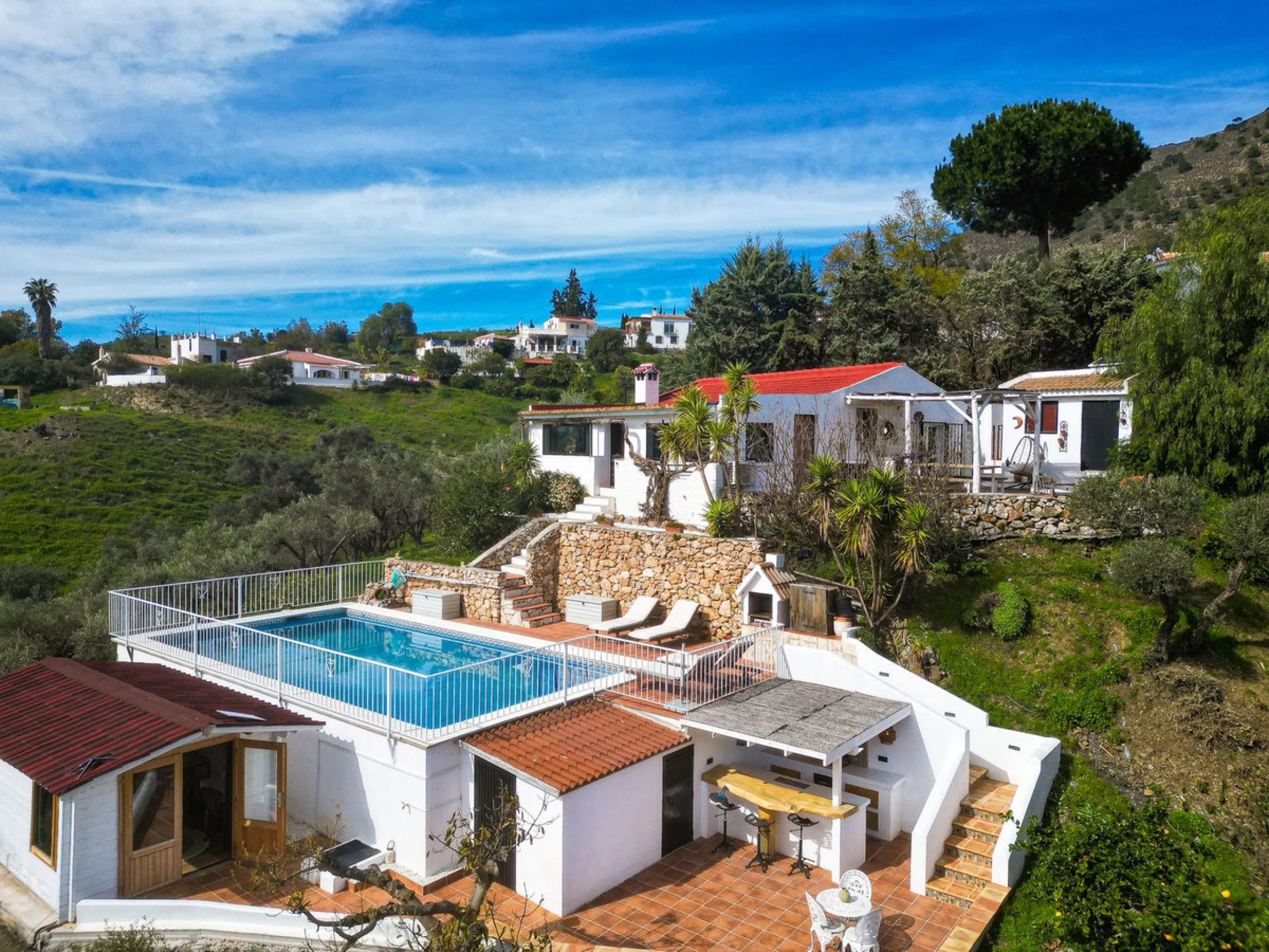 Beautiful countryside villa located in a peaceful valley setting, just a short drive from the vibrant town of Cómpeta. This beautiful country house has been renovated to the highest standards of quality and elegance, offering a refined modern-zen style fi