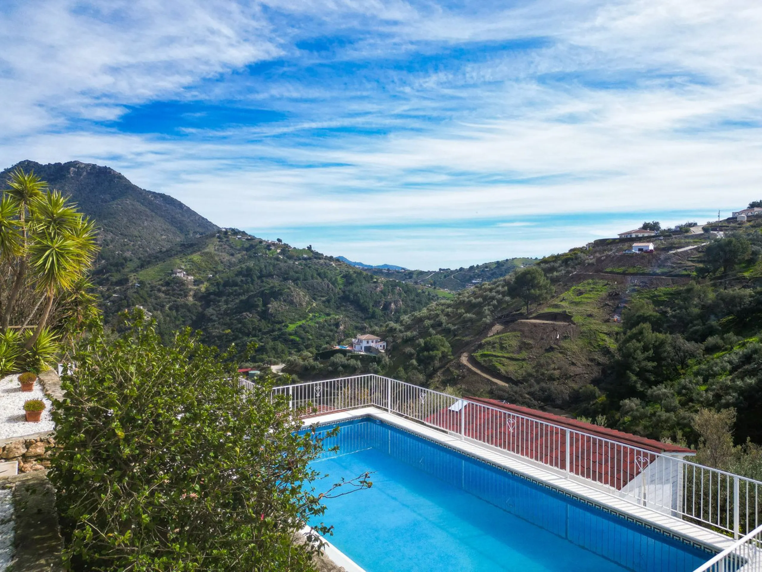 Beautiful countryside villa located in a peaceful valley setting, just a short drive from the vibrant town of Cómpeta. This beautiful country house has been renovated to the highest standards of quality and elegance, offering a refined modern-zen style fi