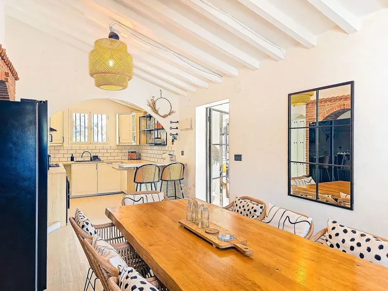 Beautiful countryside villa located in a peaceful valley setting, just a short drive from the vibrant town of Cómpeta. This beautiful country house has been renovated to the highest standards of quality and elegance, offering a refined modern-zen style fi