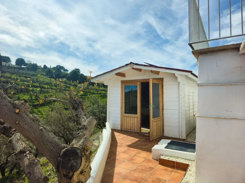 Beautiful countryside villa located in a peaceful valley setting, just a short drive from the vibrant town of Cómpeta. This beautiful country house has been renovated to the highest standards of quality and elegance, offering a refined modern-zen style fi