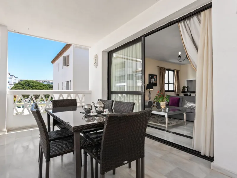 A prime apartment for sale in Puerto Banús, located within the prestigious beachfront Club Playas del Duque complex.