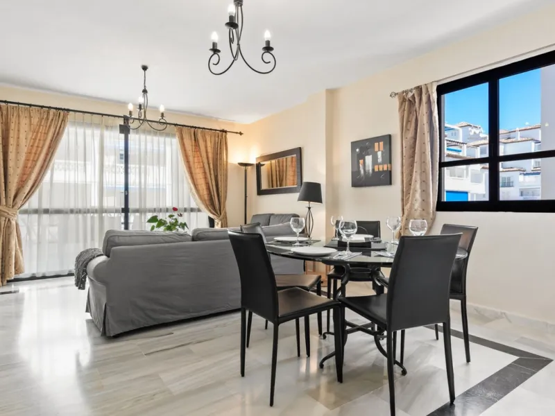 A prime apartment for sale in Puerto Banús, located within the prestigious beachfront Club Playas del Duque complex.