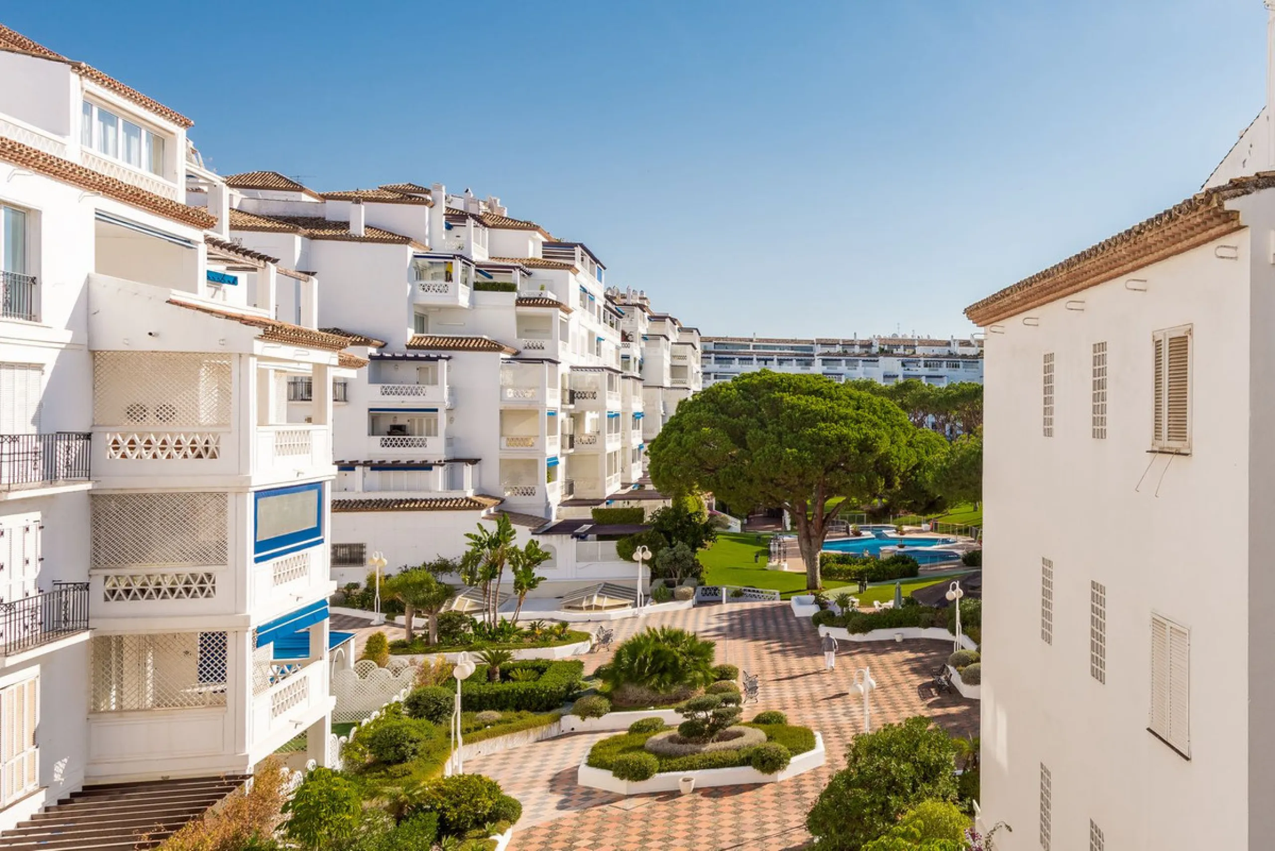 A prime apartment for sale in Puerto Banús, located within the prestigious beachfront Club Playas del Duque complex.