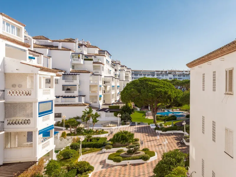 A prime apartment for sale in Puerto Banús, located within the prestigious beachfront Club Playas del Duque complex.