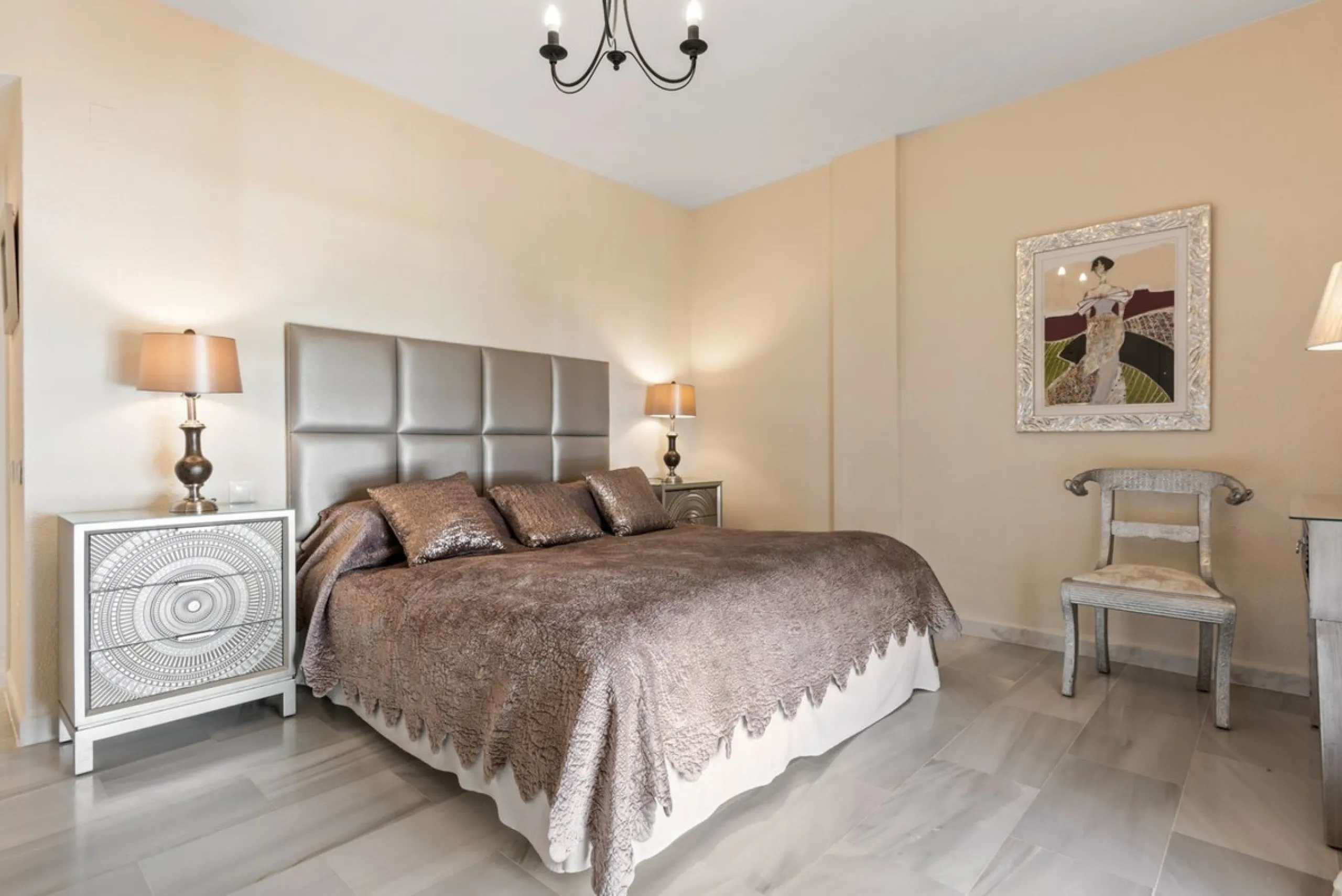A prime apartment for sale in Puerto Banús, located within the prestigious beachfront Club Playas del Duque complex.