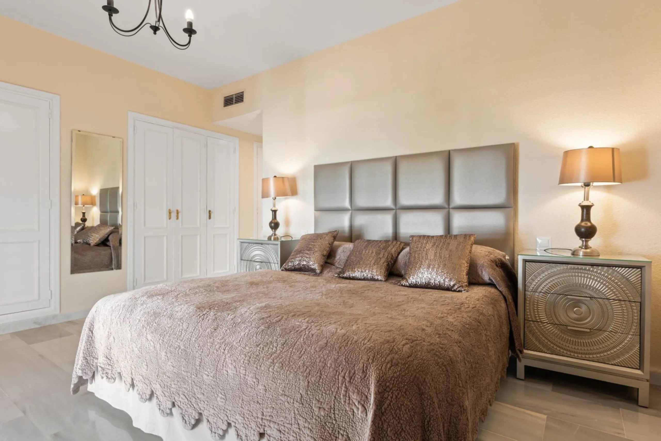 A prime apartment for sale in Puerto Banús, located within the prestigious beachfront Club Playas del Duque complex.