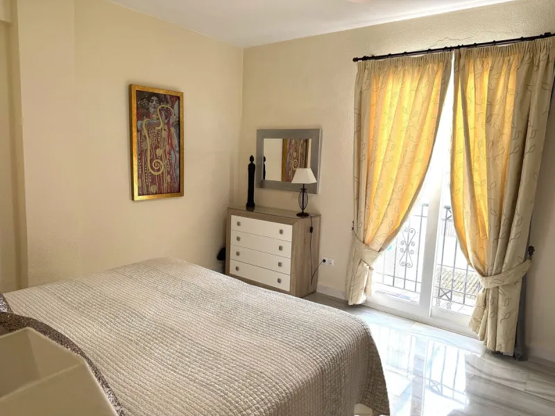 A prime apartment for sale in Puerto Banús, located within the prestigious beachfront Club Playas del Duque complex.