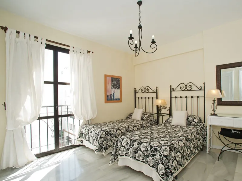 A prime apartment for sale in Puerto Banús, located within the prestigious beachfront Club Playas del Duque complex.