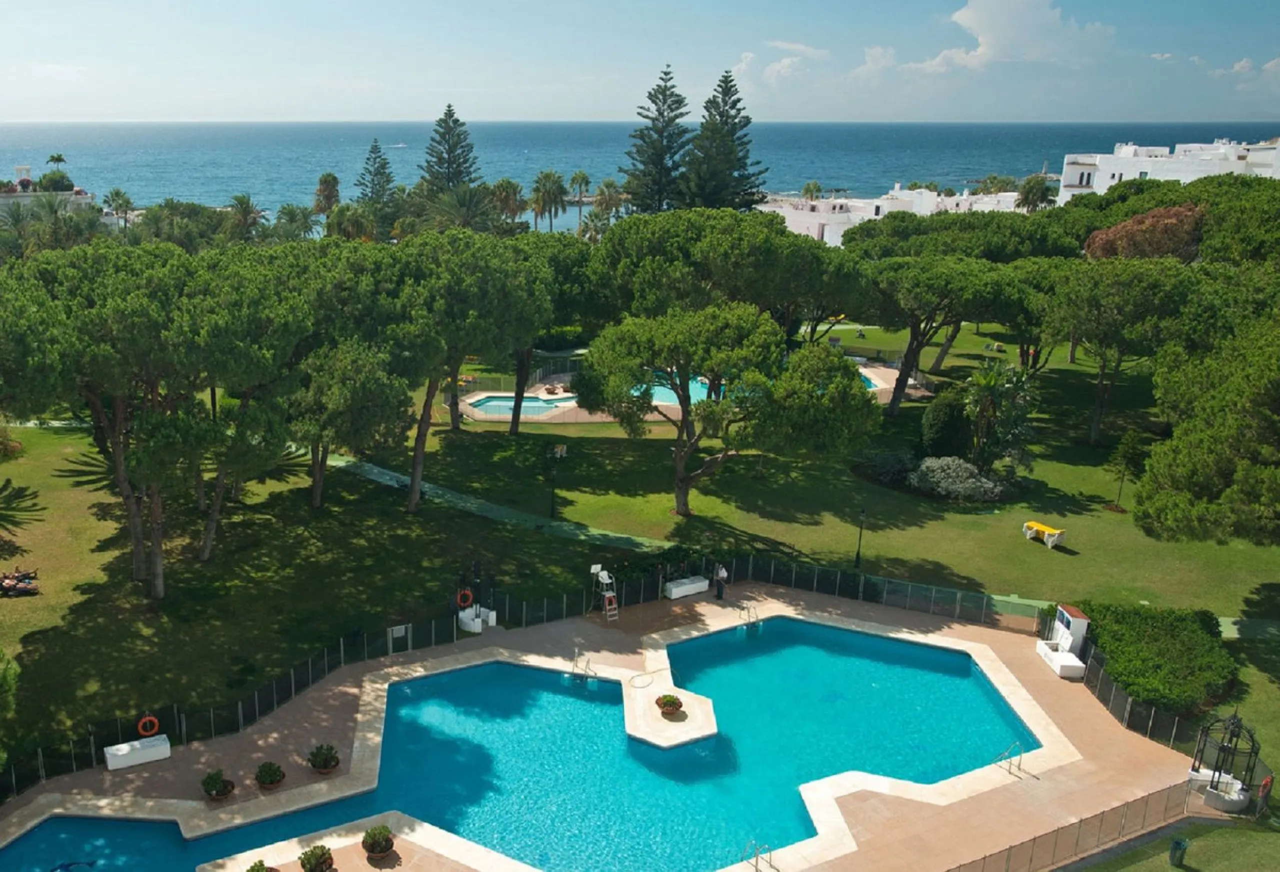 A prime apartment for sale in Puerto Banús, located within the prestigious beachfront Club Playas del Duque complex.