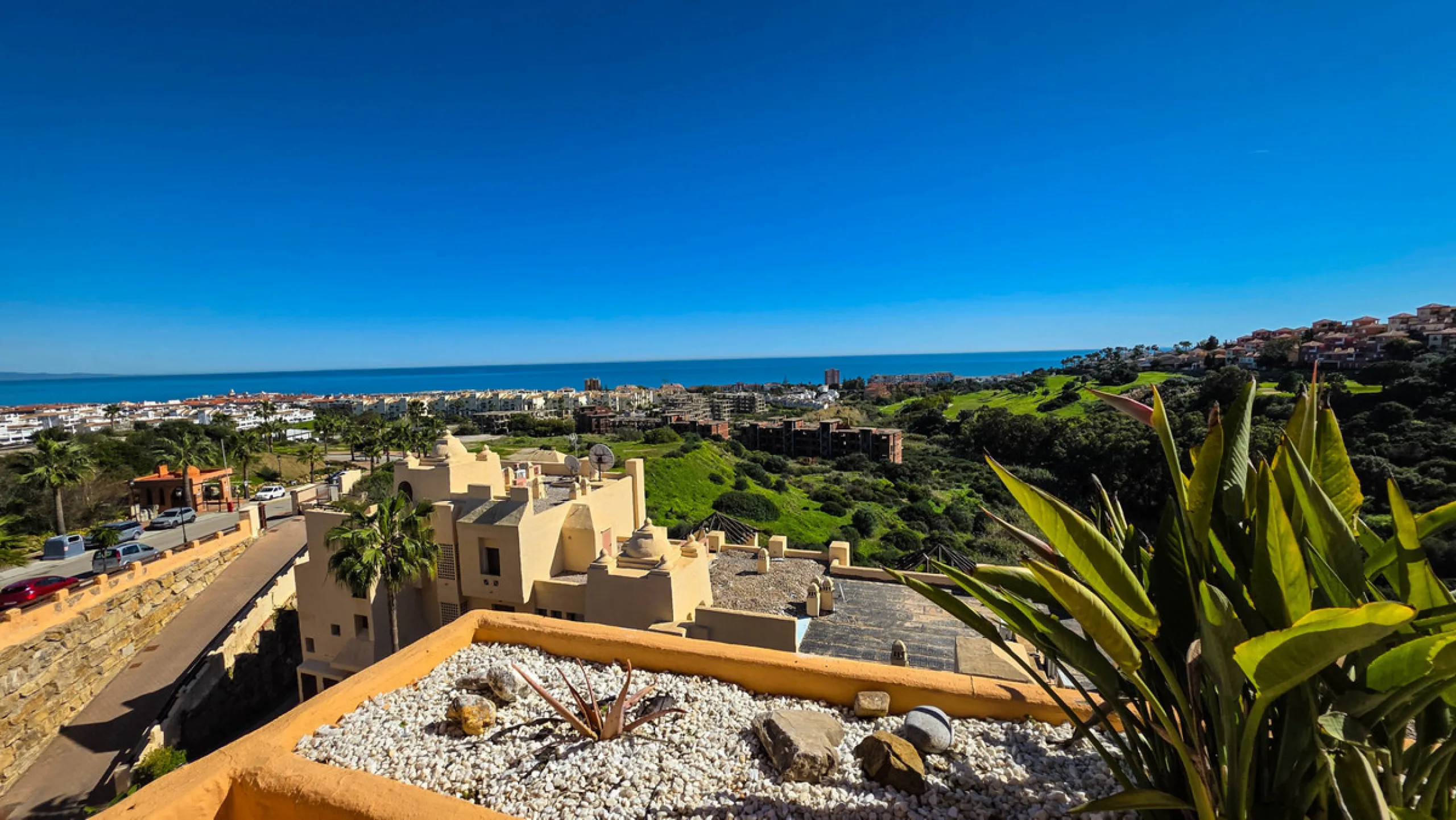 Positioned in a prime corner location within Phase 1 of a well-established development in La Duquesa, this penthouse offers panoramic sea views that truly define the property. From its elevated setting, the Mediterranean stretches across the horizon, crea