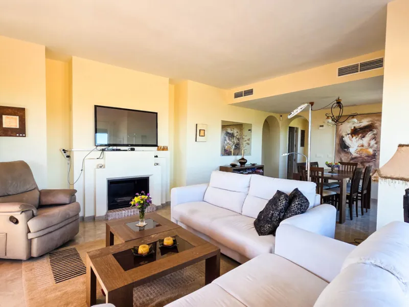 Positioned in a prime corner location within Phase 1 of a well-established development in La Duquesa, this penthouse offers panoramic sea views that truly define the property. From its elevated setting, the Mediterranean stretches across the horizon, crea