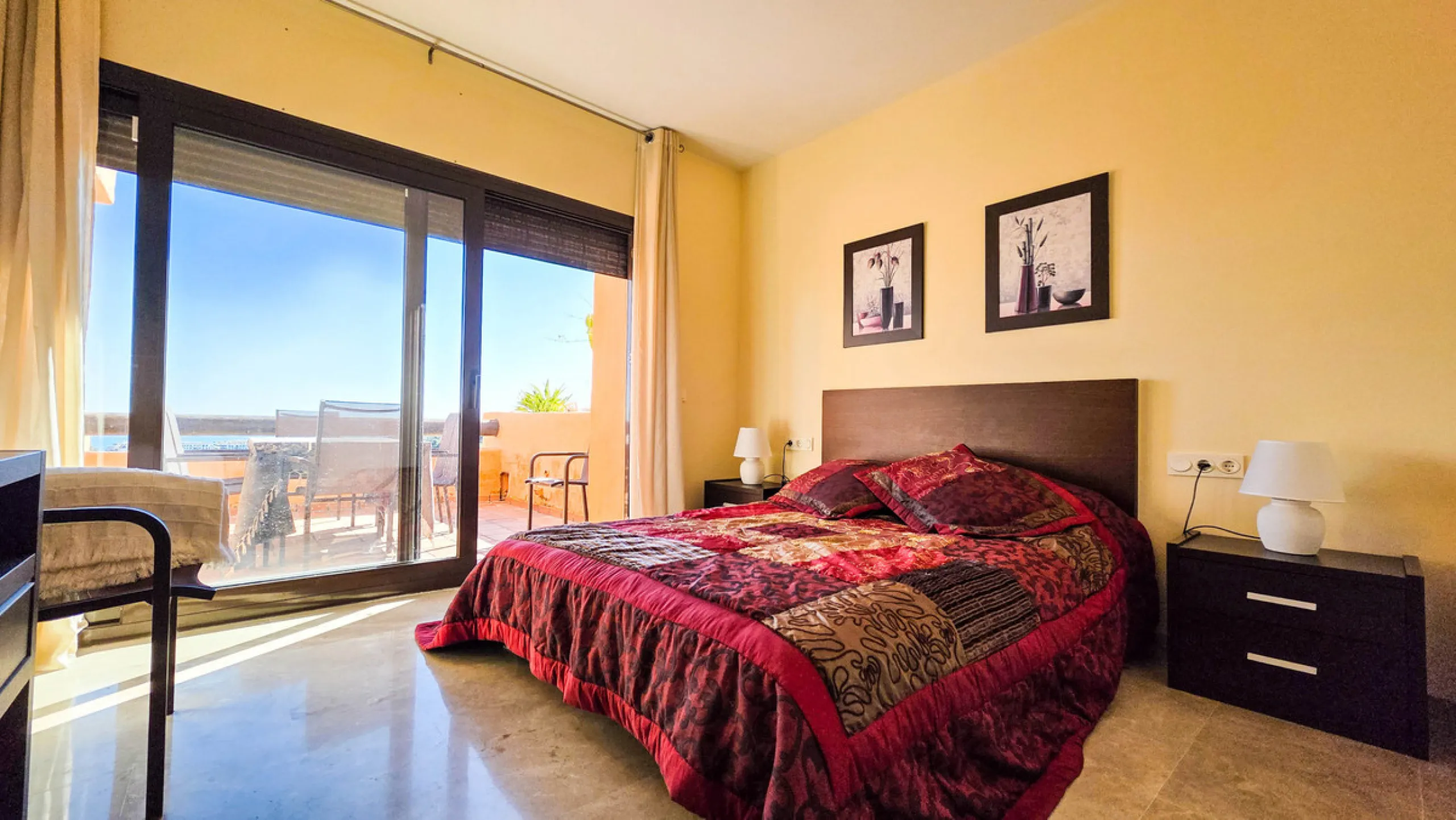 Positioned in a prime corner location within Phase 1 of a well-established development in La Duquesa, this penthouse offers panoramic sea views that truly define the property. From its elevated setting, the Mediterranean stretches across the horizon, crea