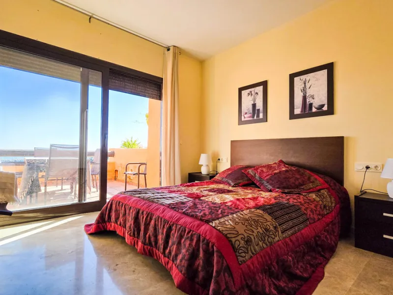 Positioned in a prime corner location within Phase 1 of a well-established development in La Duquesa, this penthouse offers panoramic sea views that truly define the property. From its elevated setting, the Mediterranean stretches across the horizon, crea