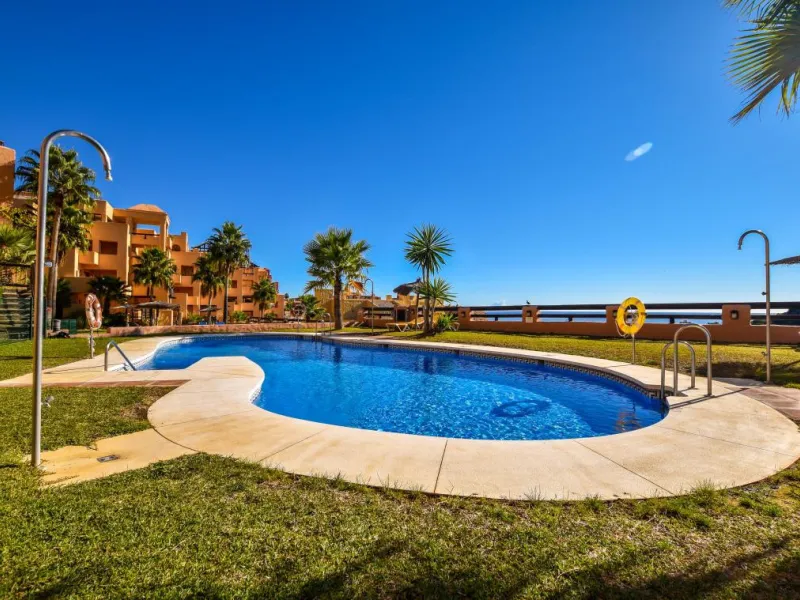 Positioned in a prime corner location within Phase 1 of a well-established development in La Duquesa, this penthouse offers panoramic sea views that truly define the property. From its elevated setting, the Mediterranean stretches across the horizon, crea