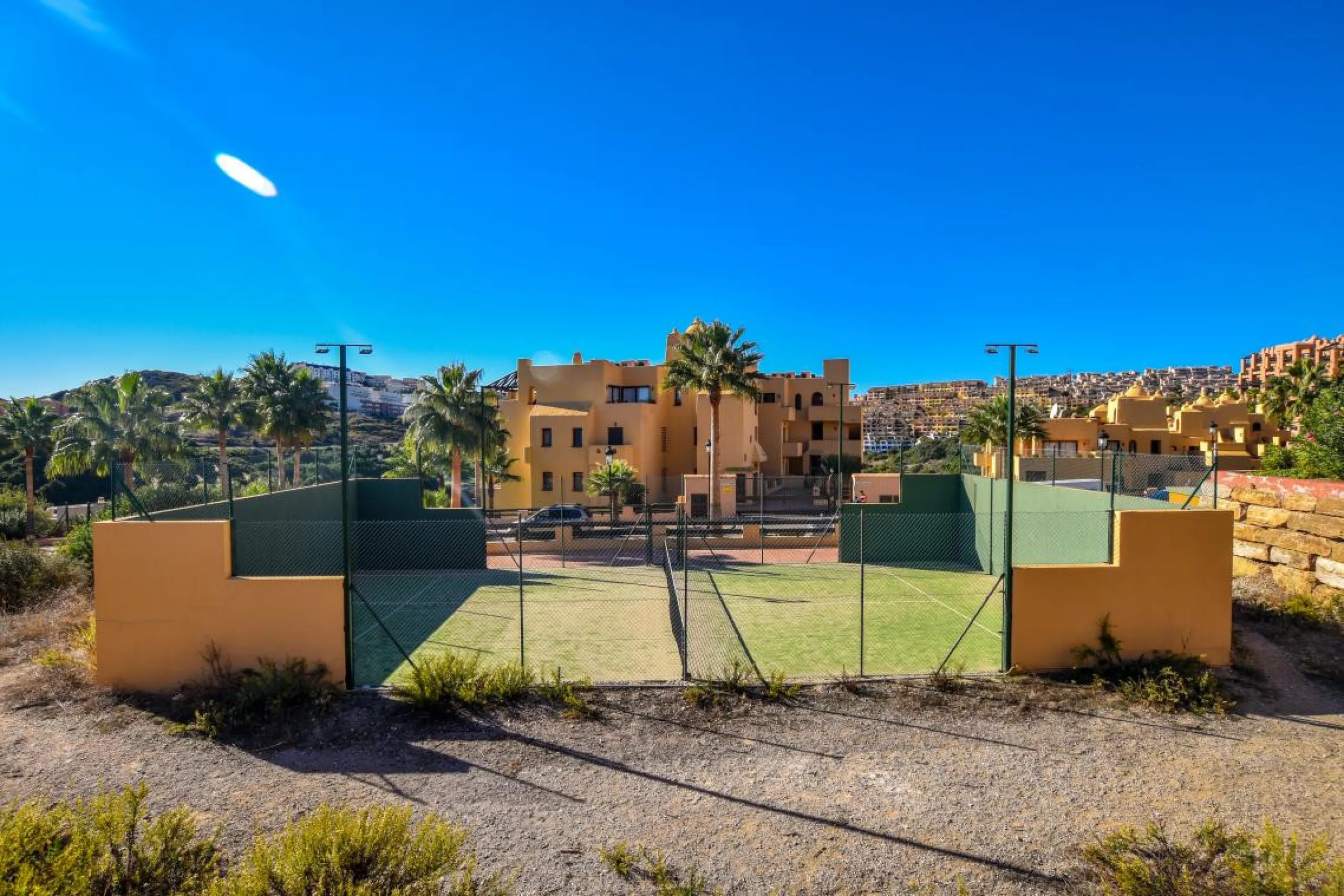 This well-presented corner penthouse in La Duquesa combines generous outdoor space, sea views and a convenient coastal location within walking distance to the beach. Set within a popular residential community, the property offers access to four communal s