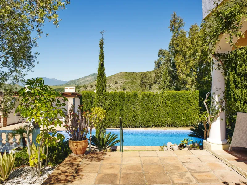 This charming 5 bedroom Andalucian villa is nestled in the exclusive enclave of Puerto de Los Almendros in Benahavis, surrounded by nature but still close to schools, supermarkets and town.. The property has been a much loved family home for over 4 decade
