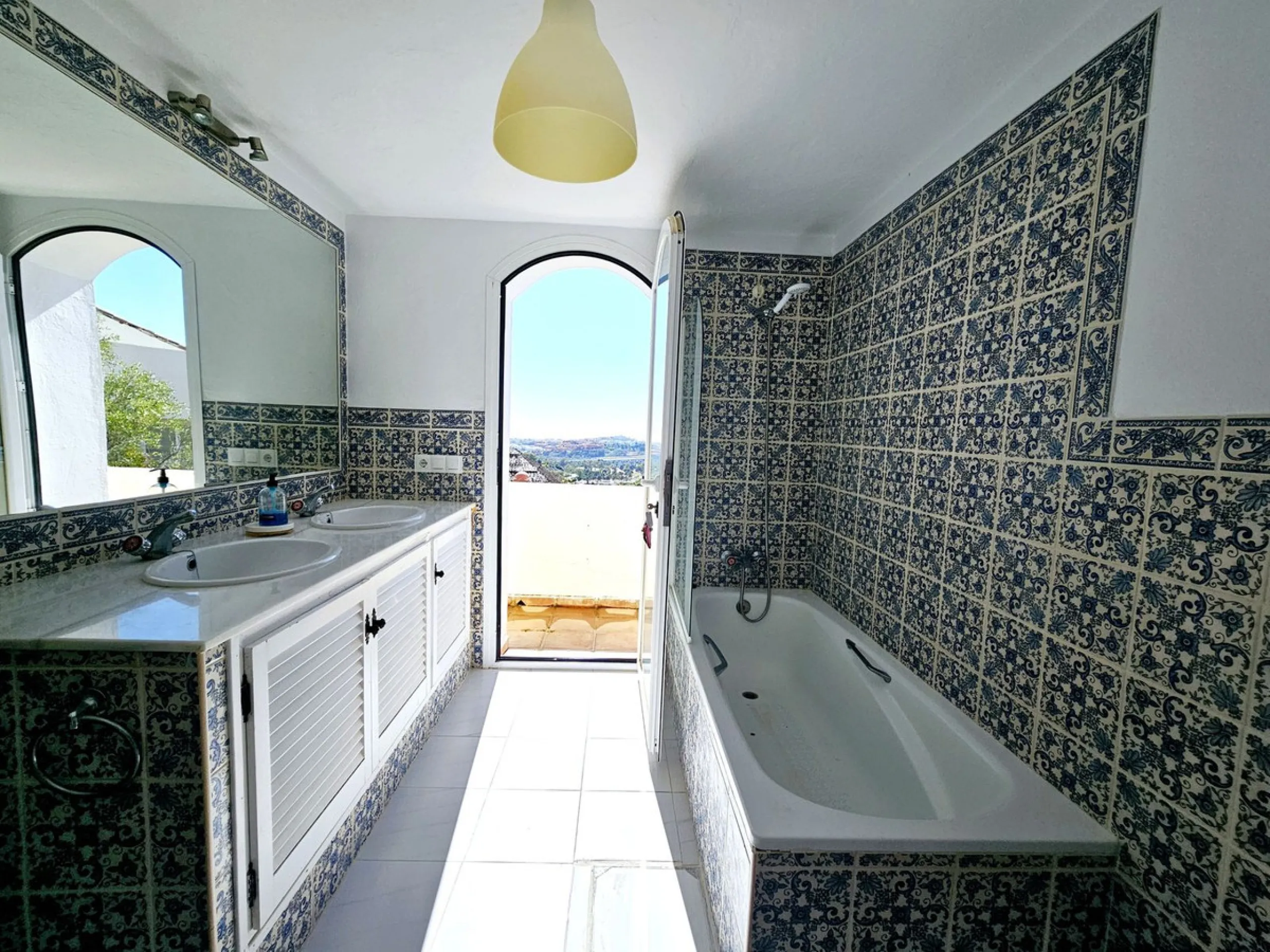 This charming 5 bedroom Andalucian villa is nestled in the exclusive enclave of Puerto de Los Almendros in Benahavis, surrounded by nature but still close to schools, supermarkets and town.. The property has been a much loved family home for over 4 decade