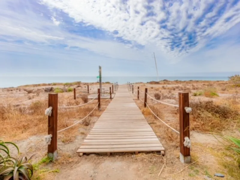 Located in the exclusive beachside community of Villas de Costalita, within walking distance to the beach, this elegant townhouse enjoys a peaceful setting in a beautifully maintained residential complex just moments from the sea.