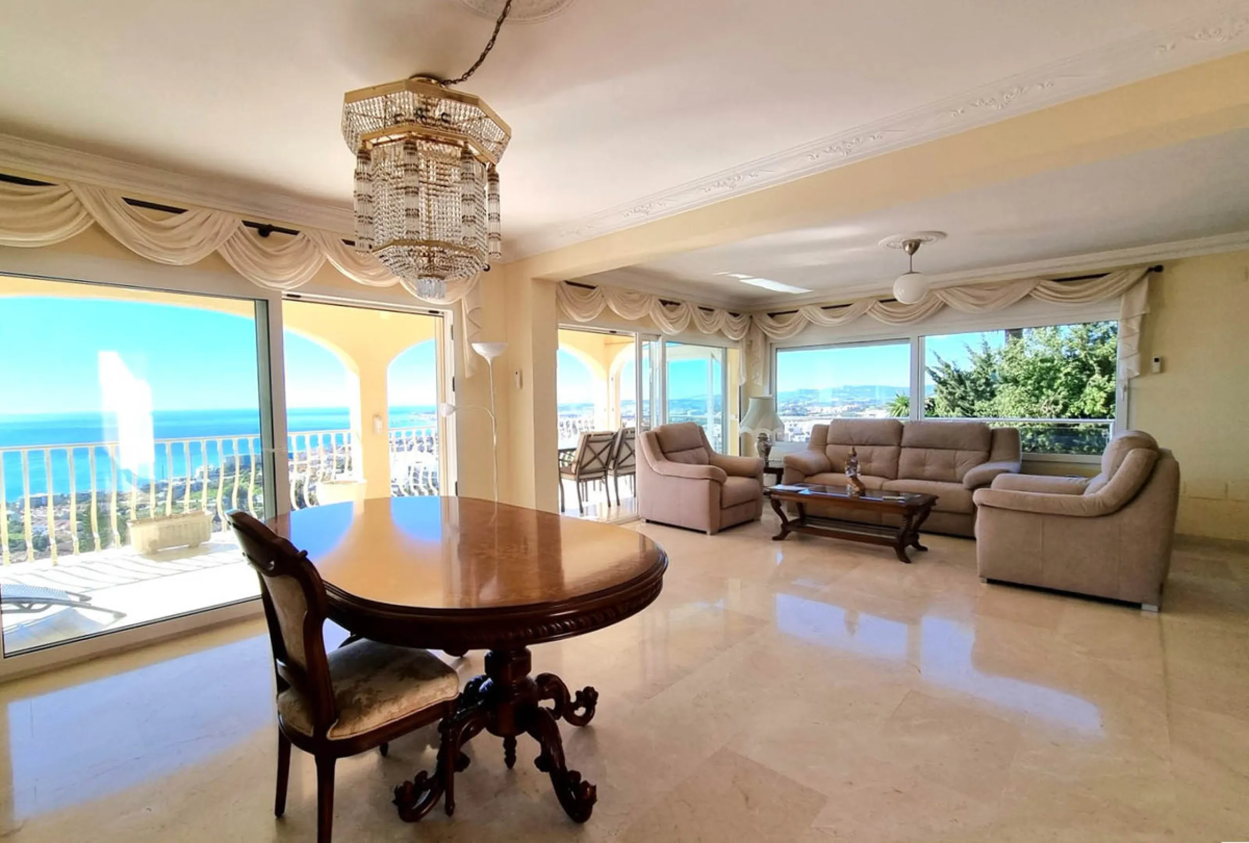 Located in the prestigious La Capellania area of the Costa del Sol, this exceptional 5-bedroom villa masterfully blends modern luxury with timeless Mediterranean charm, offering breathtaking panoramic sea views and an enviable lifestyle in one of southern
