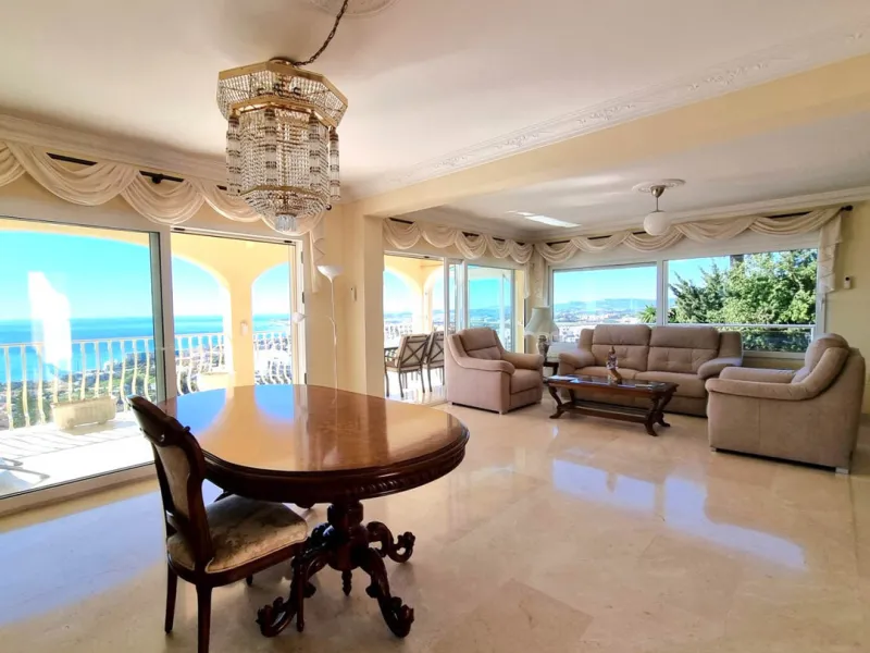 Located in the prestigious La Capellania area of the Costa del Sol, this exceptional 5-bedroom villa masterfully blends modern luxury with timeless Mediterranean charm, offering breathtaking panoramic sea views and an enviable lifestyle in one of southern
