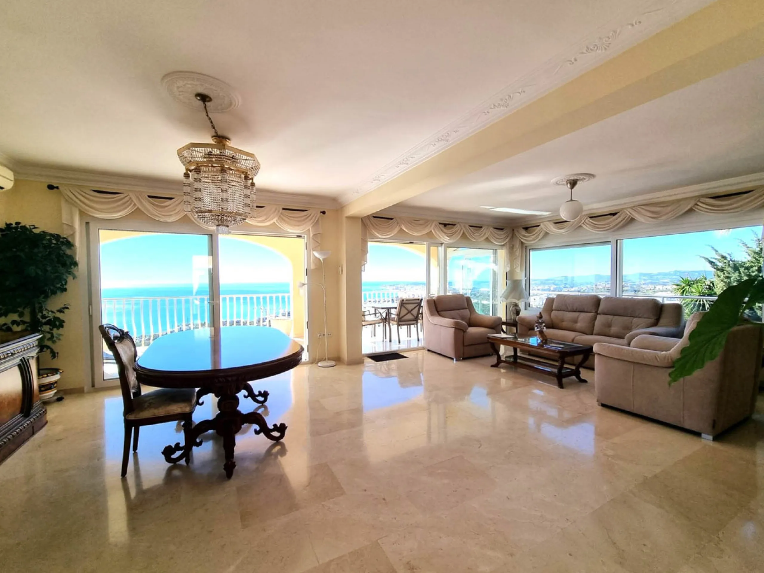 Located in the prestigious La Capellania area of the Costa del Sol, this exceptional 5-bedroom villa masterfully blends modern luxury with timeless Mediterranean charm, offering breathtaking panoramic sea views and an enviable lifestyle in one of southern