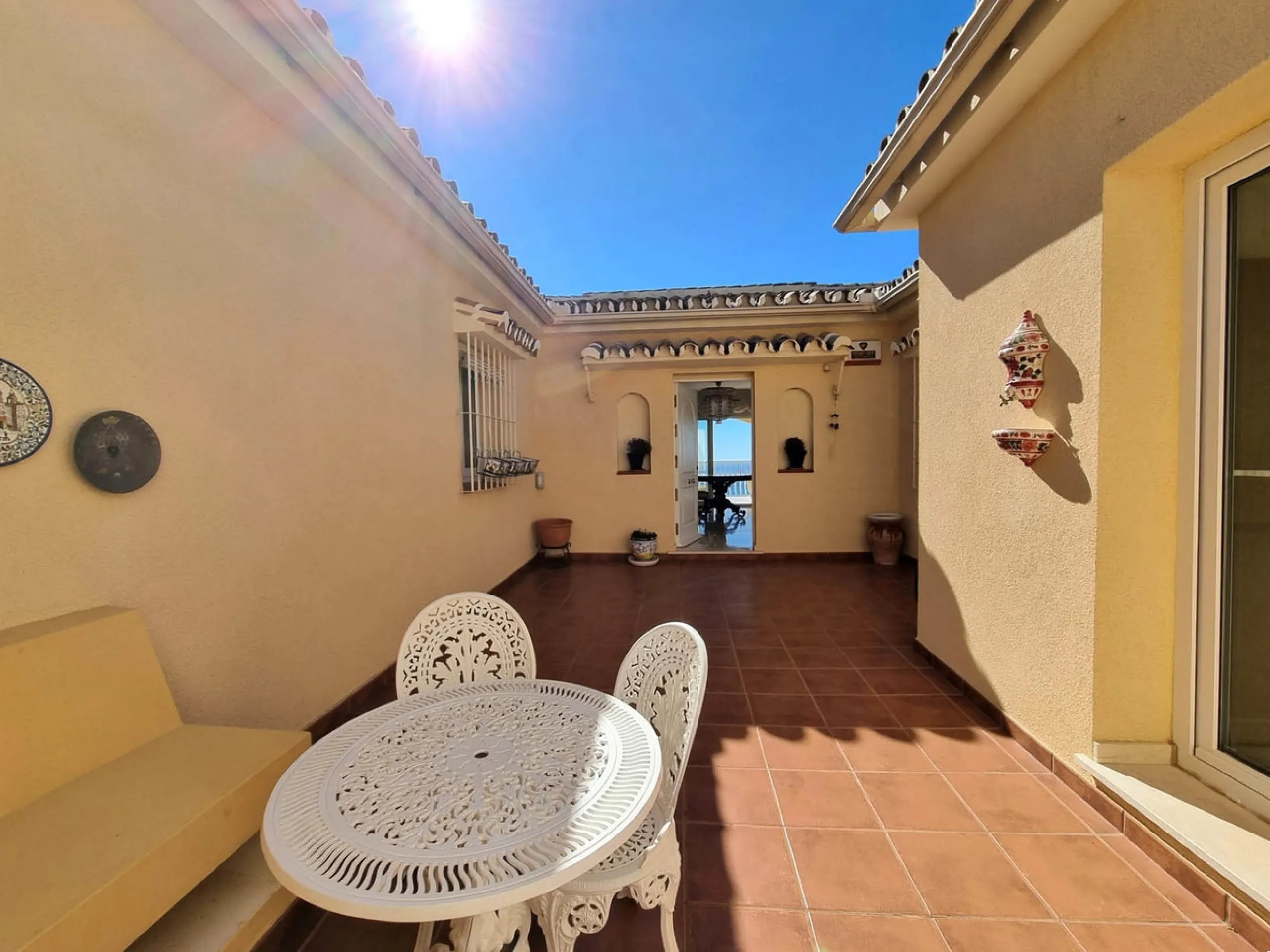 Located in the prestigious La Capellania area of the Costa del Sol, this exceptional 5-bedroom villa masterfully blends modern luxury with timeless Mediterranean charm, offering breathtaking panoramic sea views and an enviable lifestyle in one of southern