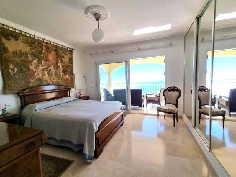 Located in the prestigious La Capellania area of the Costa del Sol, this exceptional 5-bedroom villa masterfully blends modern luxury with timeless Mediterranean charm, offering breathtaking panoramic sea views and an enviable lifestyle in one of southern