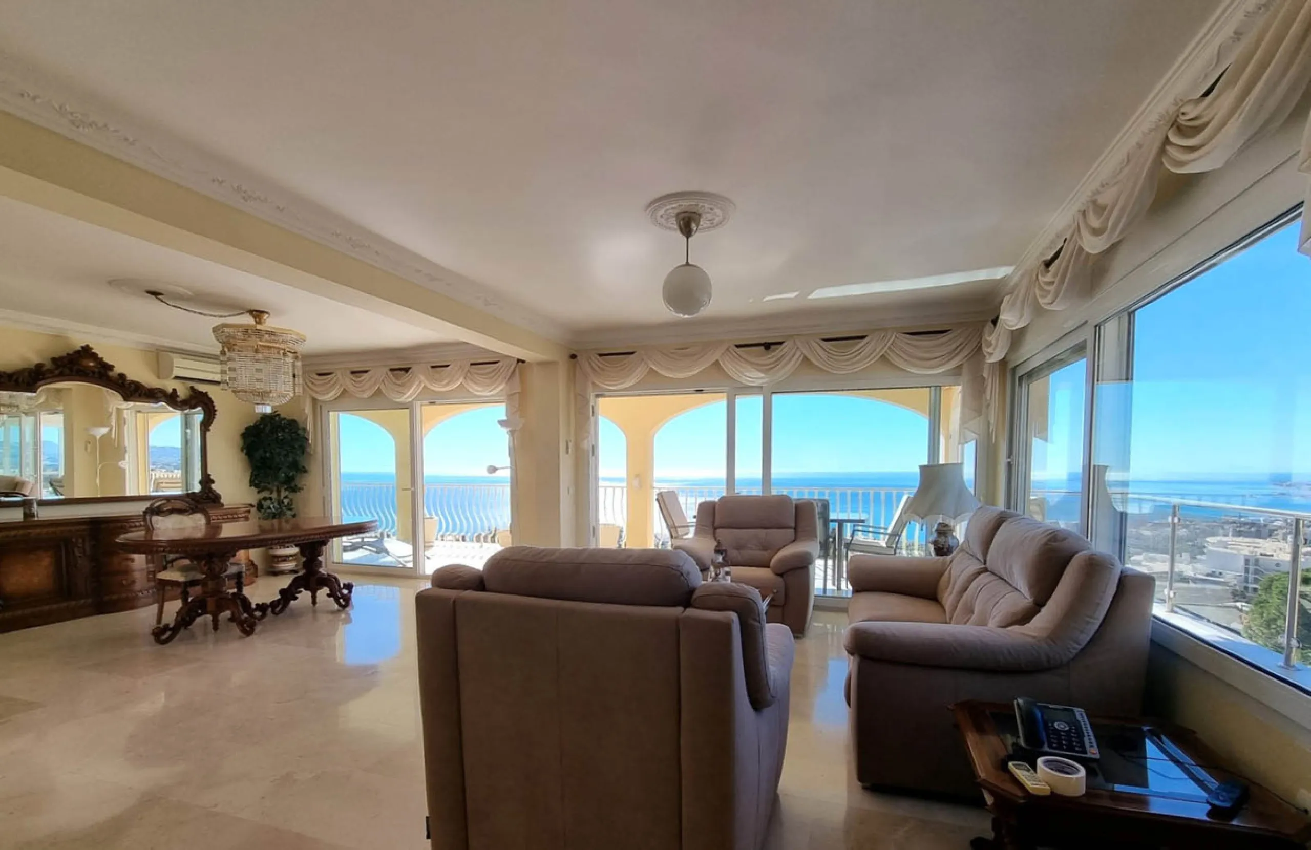 Located in the prestigious La Capellania area of the Costa del Sol, this exceptional 5-bedroom villa masterfully blends modern luxury with timeless Mediterranean charm, offering breathtaking panoramic sea views and an enviable lifestyle in one of southern