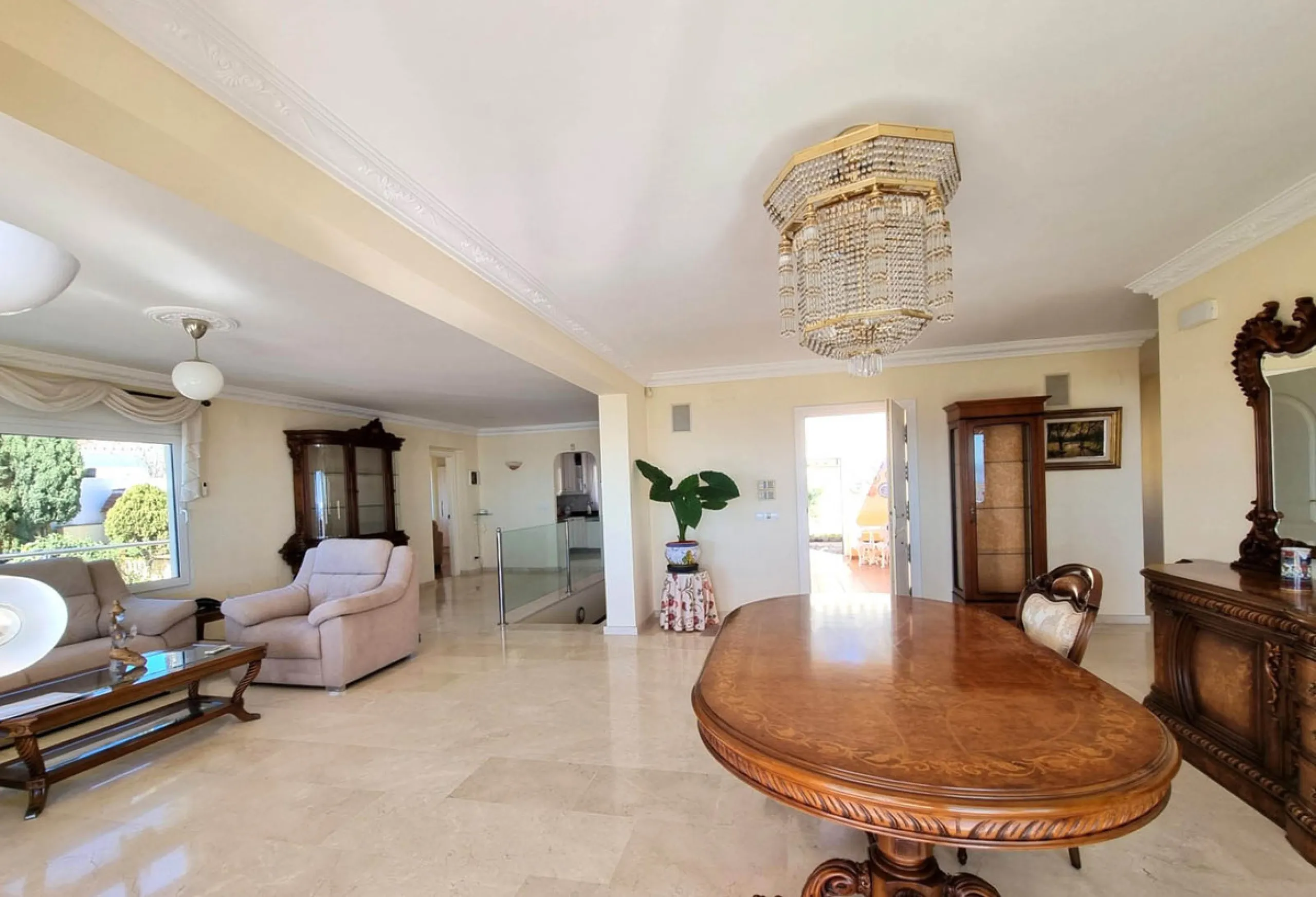 Located in the prestigious La Capellania area of the Costa del Sol, this exceptional 5-bedroom villa masterfully blends modern luxury with timeless Mediterranean charm, offering breathtaking panoramic sea views and an enviable lifestyle in one of southern