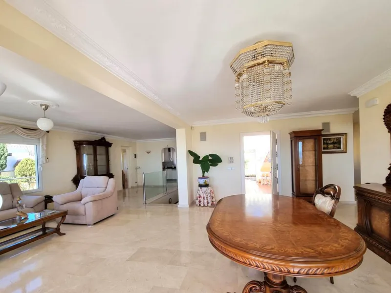 Located in the prestigious La Capellania area of the Costa del Sol, this exceptional 5-bedroom villa masterfully blends modern luxury with timeless Mediterranean charm, offering breathtaking panoramic sea views and an enviable lifestyle in one of southern