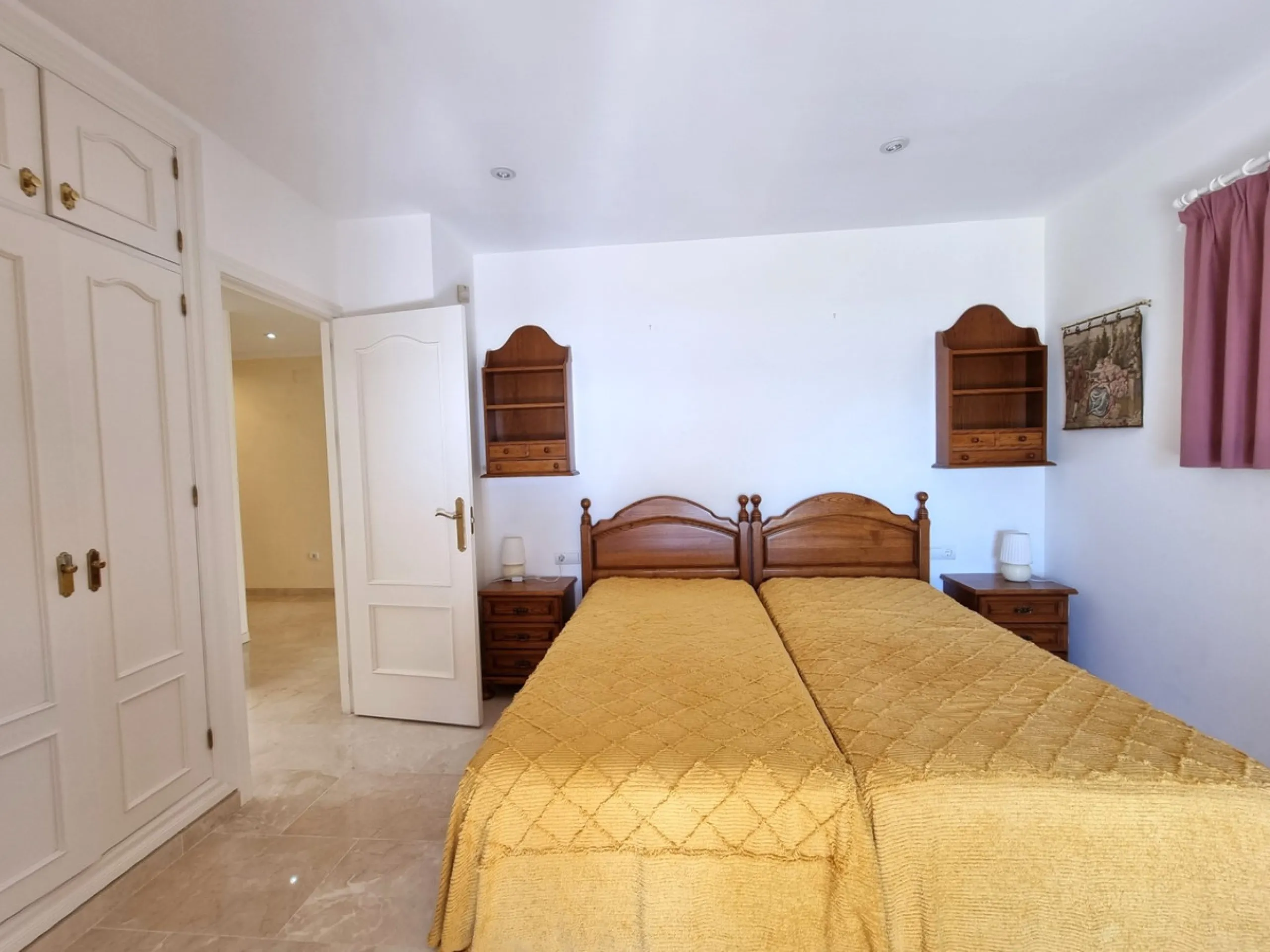 Located in the prestigious La Capellania area of the Costa del Sol, this exceptional 5-bedroom villa masterfully blends modern luxury with timeless Mediterranean charm, offering breathtaking panoramic sea views and an enviable lifestyle in one of southern