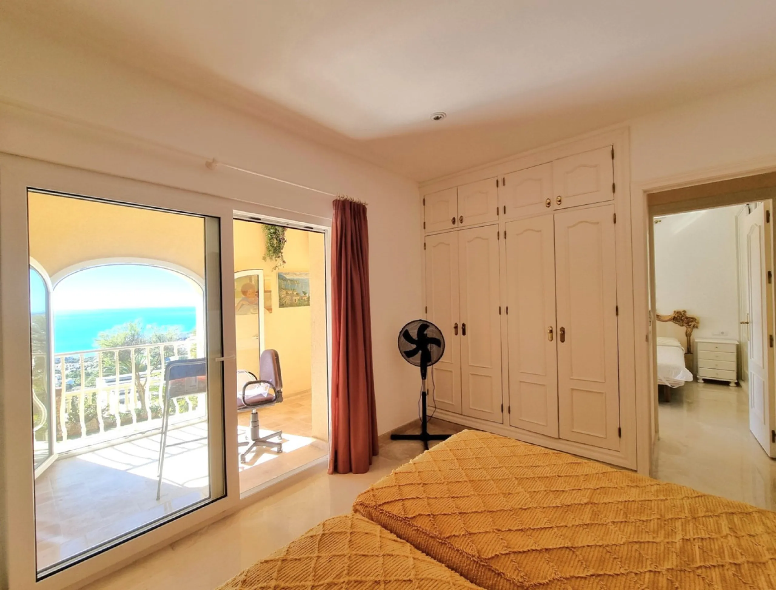 Located in the prestigious La Capellania area of the Costa del Sol, this exceptional 5-bedroom villa masterfully blends modern luxury with timeless Mediterranean charm, offering breathtaking panoramic sea views and an enviable lifestyle in one of southern