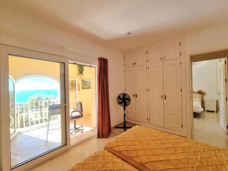 Located in the prestigious La Capellania area of the Costa del Sol, this exceptional 5-bedroom villa masterfully blends modern luxury with timeless Mediterranean charm, offering breathtaking panoramic sea views and an enviable lifestyle in one of southern