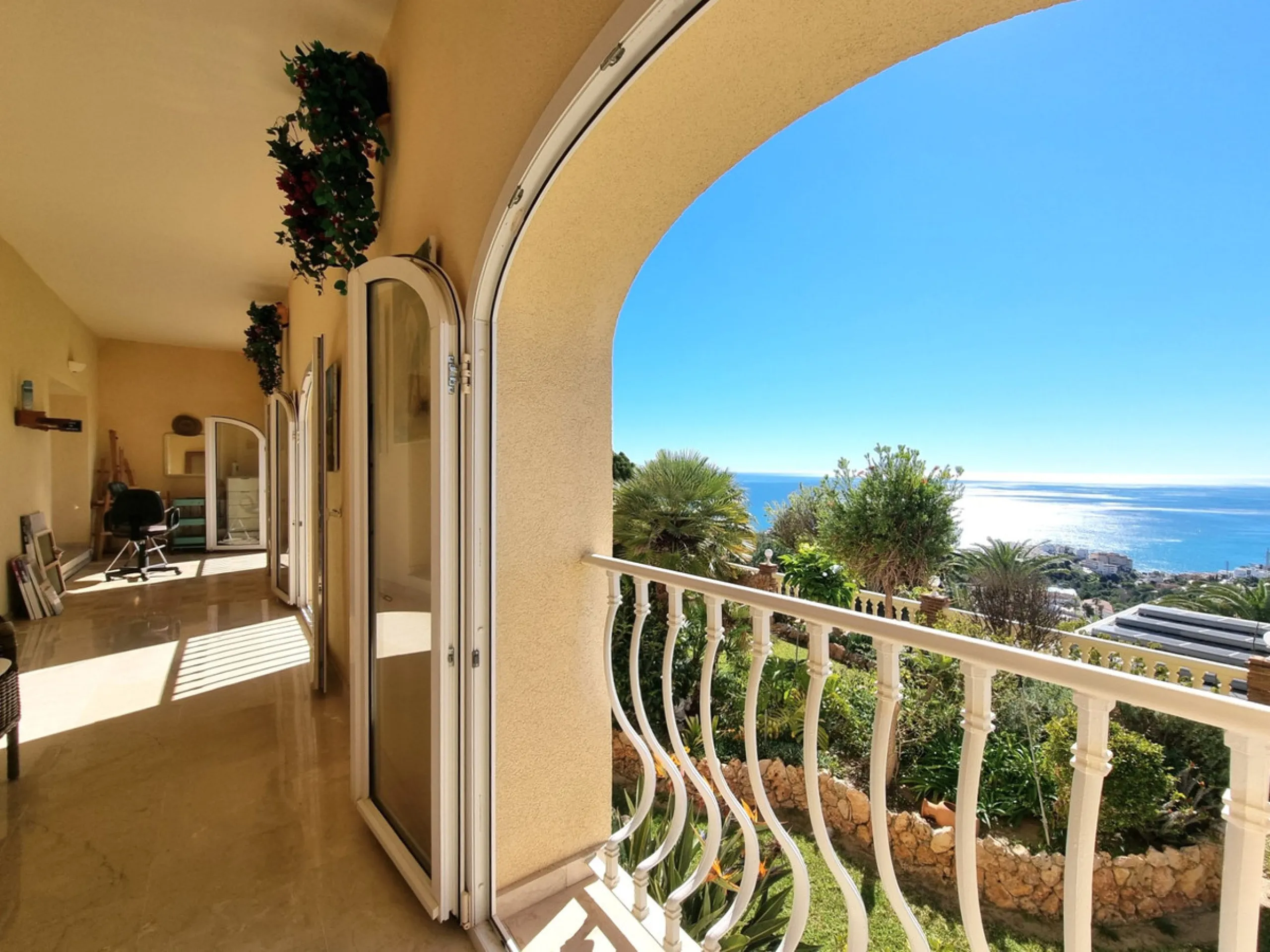 Located in the prestigious La Capellania area of the Costa del Sol, this exceptional 5-bedroom villa masterfully blends modern luxury with timeless Mediterranean charm, offering breathtaking panoramic sea views and an enviable lifestyle in one of southern