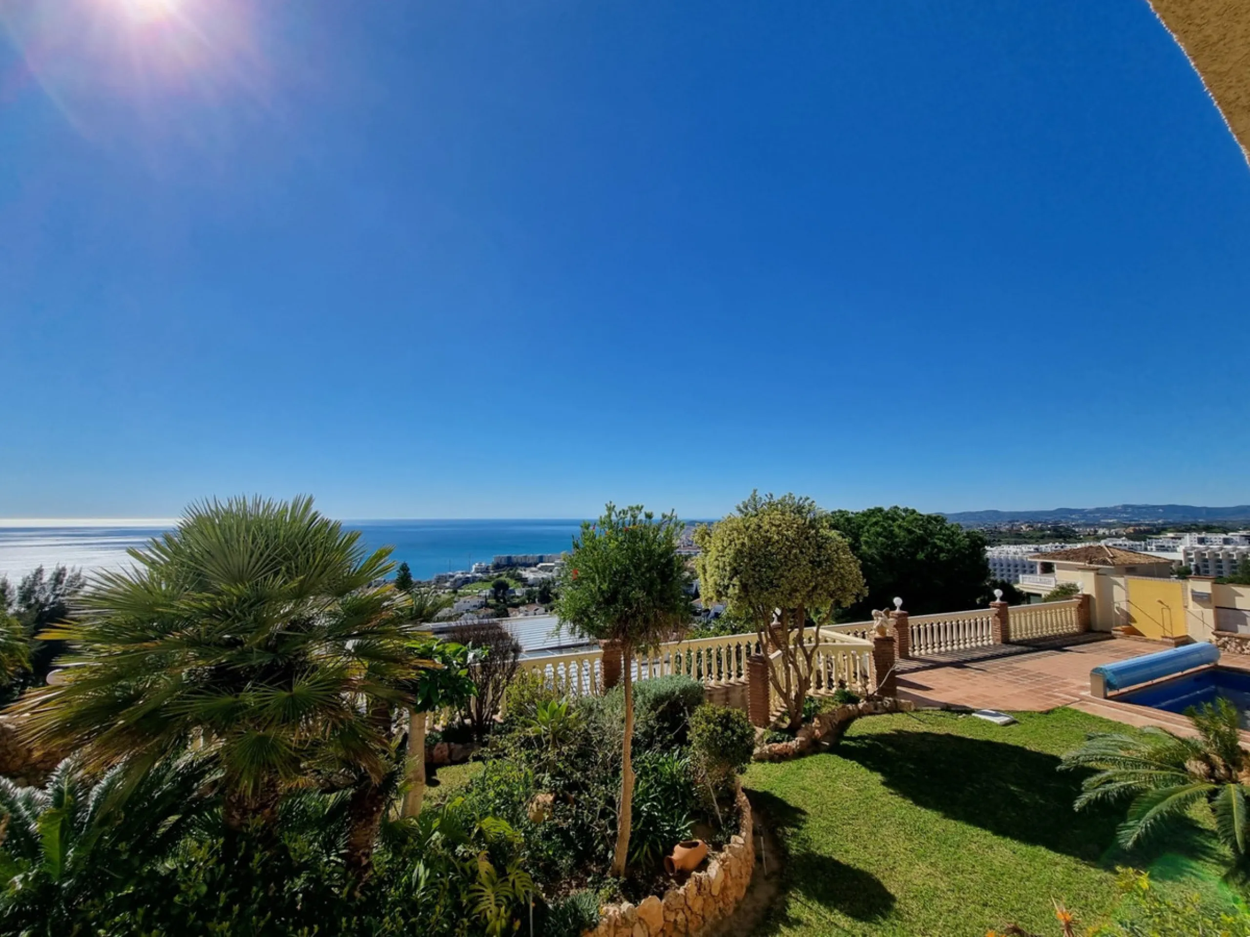 Located in the prestigious La Capellania area of the Costa del Sol, this exceptional 5-bedroom villa masterfully blends modern luxury with timeless Mediterranean charm, offering breathtaking panoramic sea views and an enviable lifestyle in one of southern