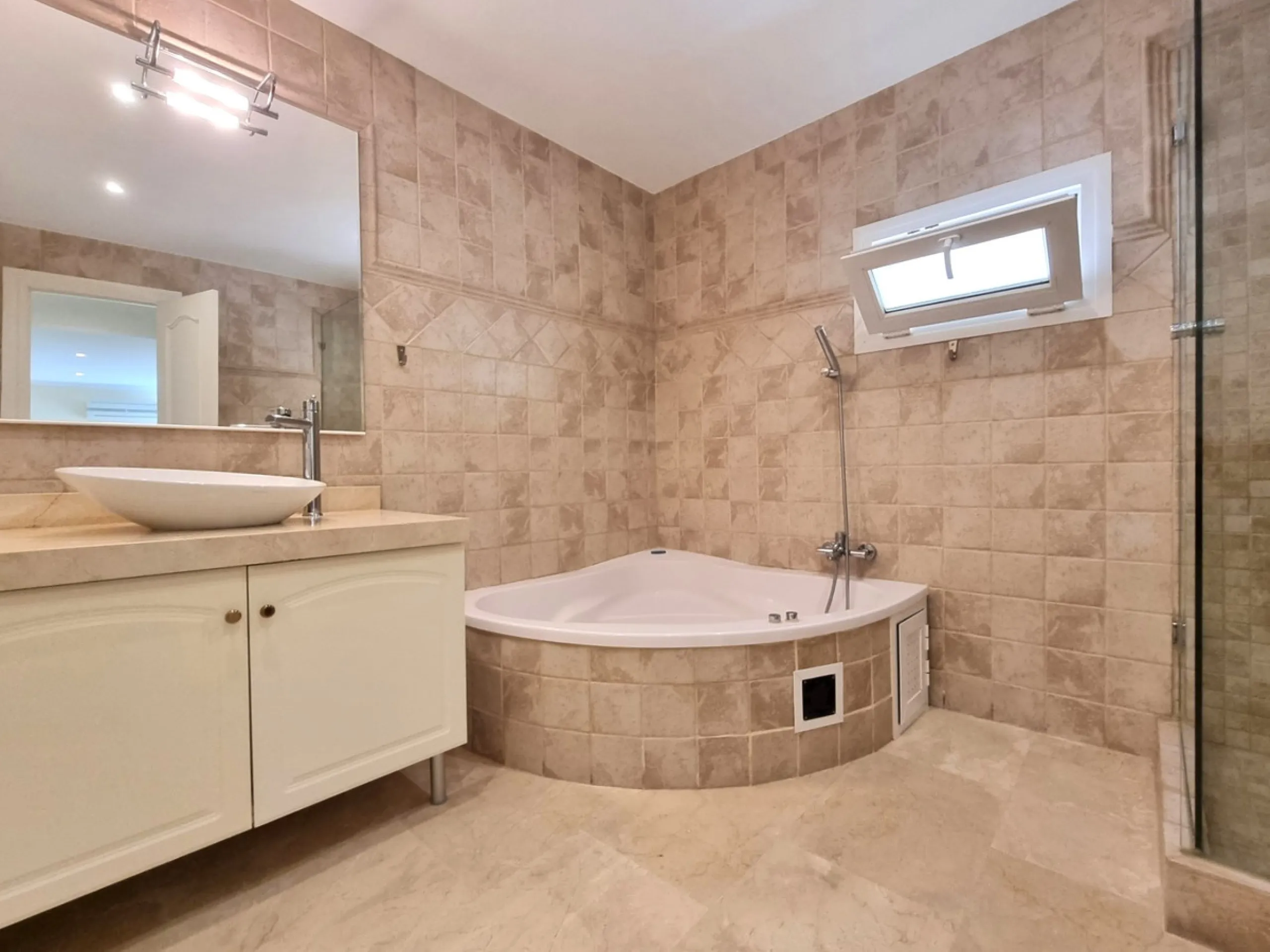 Located in the prestigious La Capellania area of the Costa del Sol, this exceptional 5-bedroom villa masterfully blends modern luxury with timeless Mediterranean charm, offering breathtaking panoramic sea views and an enviable lifestyle in one of southern