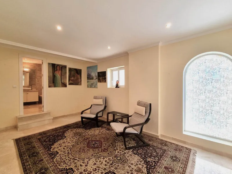 Located in the prestigious La Capellania area of the Costa del Sol, this exceptional 5-bedroom villa masterfully blends modern luxury with timeless Mediterranean charm, offering breathtaking panoramic sea views and an enviable lifestyle in one of southern