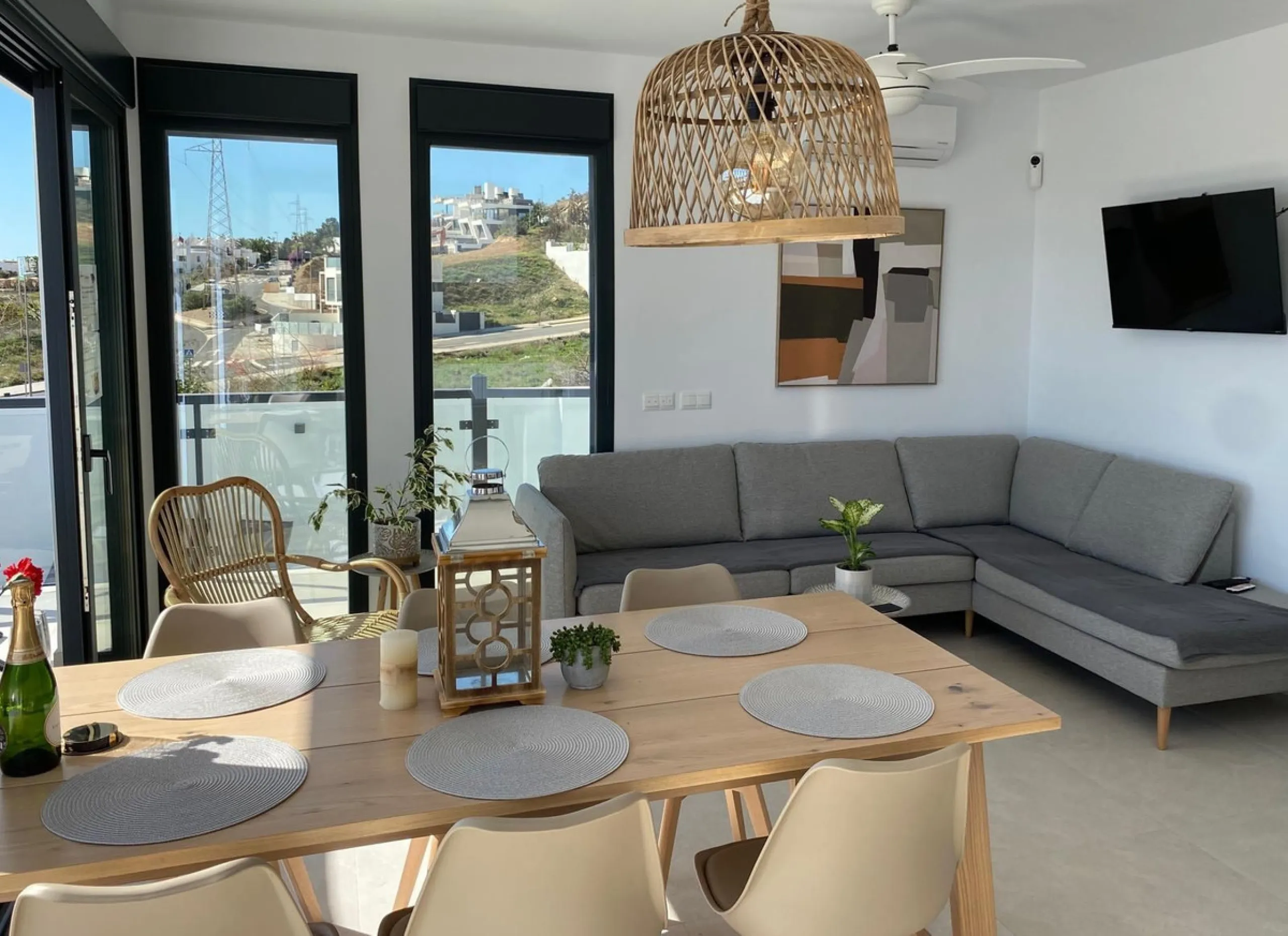 This elegant modern villa blends clean architectural lines with a warm, comfortable feel, set within a quiet residential area just outside Nerja. From its elevated position, the property enjoys spectacular views of both the sea and surrounding mountains.