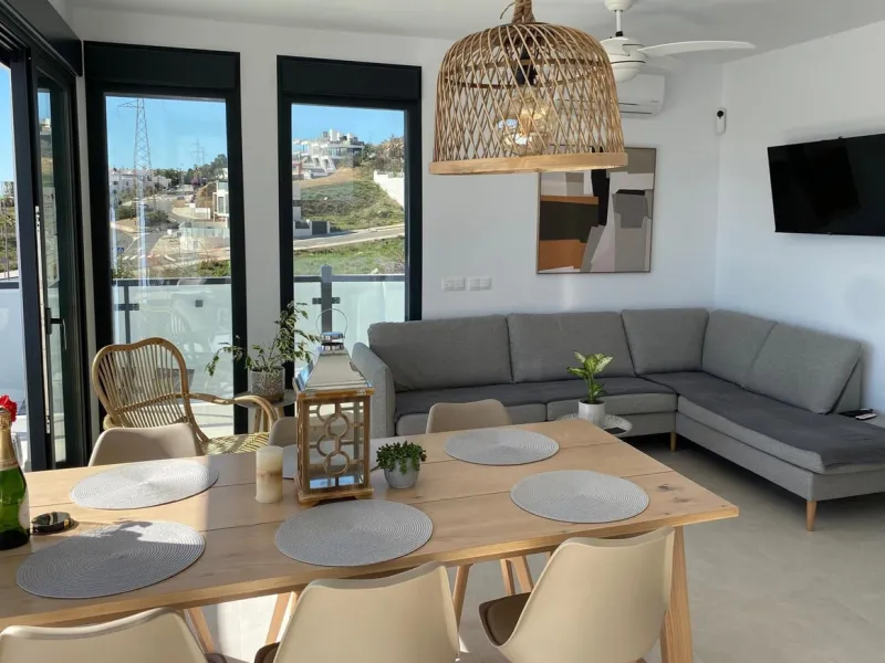 This elegant modern villa blends clean architectural lines with a warm, comfortable feel, set within a quiet residential area just outside Nerja. From its elevated position, the property enjoys spectacular views of both the sea and surrounding mountains.